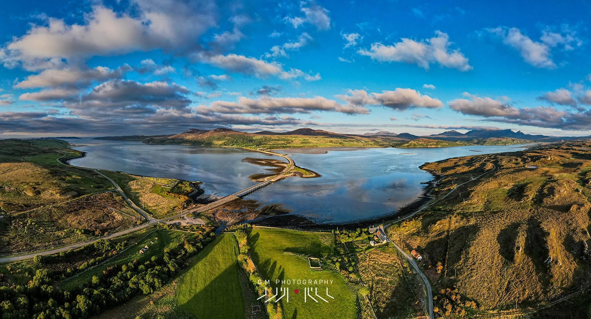 Picture taken by local photographer Gary Macleod - Aerial view of the Kyle of Tongue Causeway with a sky filled with scattered clouds.