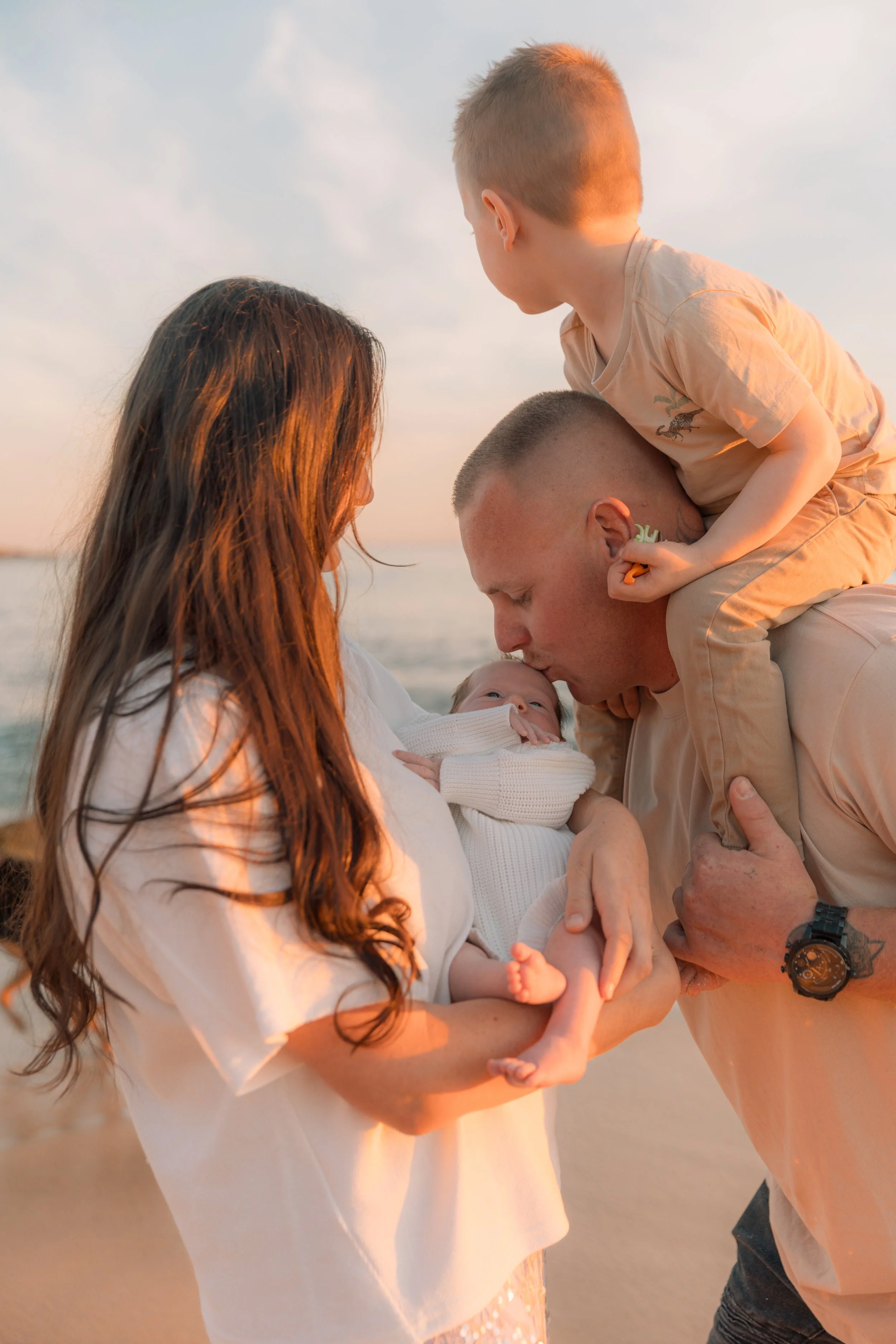 Family welcoming newborn