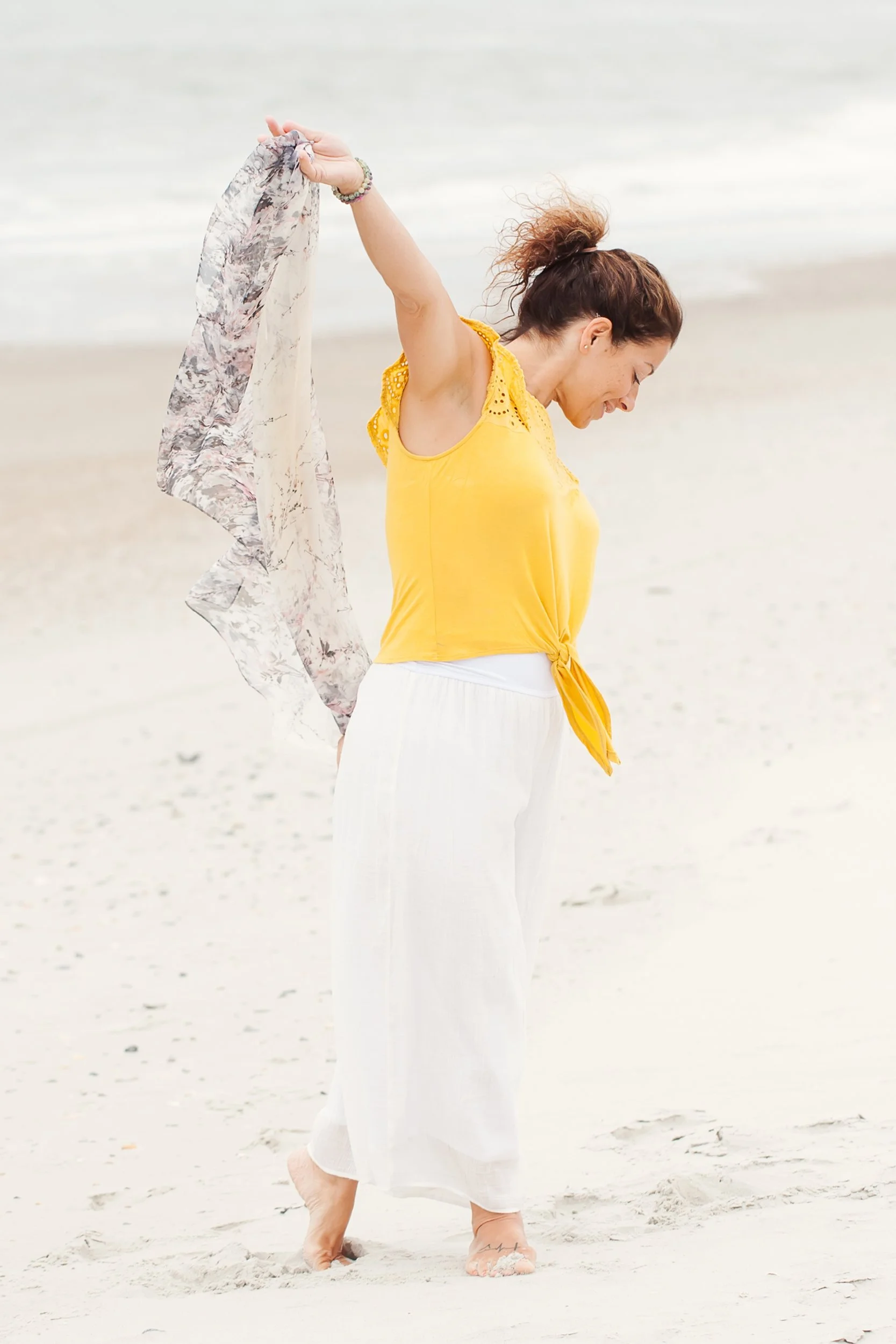 Deanna Scaldaferri, Charlotte-based wellness practitioner, experiencing the freedom and energy flow she brings to clients through Reiki and life coaching.