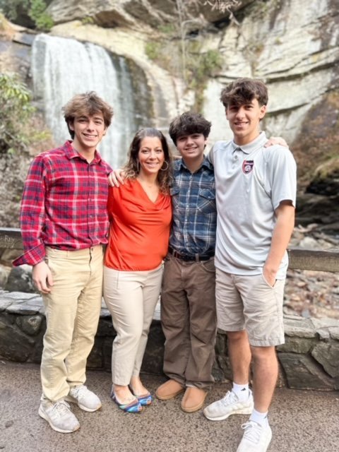 My three boys at a waterfall