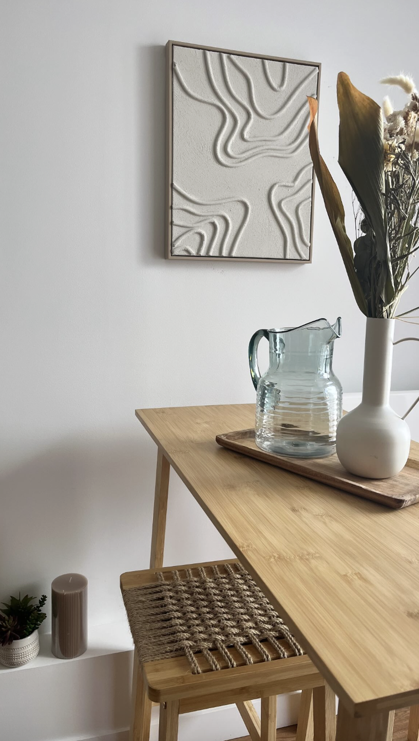 Salon d'accueil de La Maison Luma, matières naturelles et décoration douce