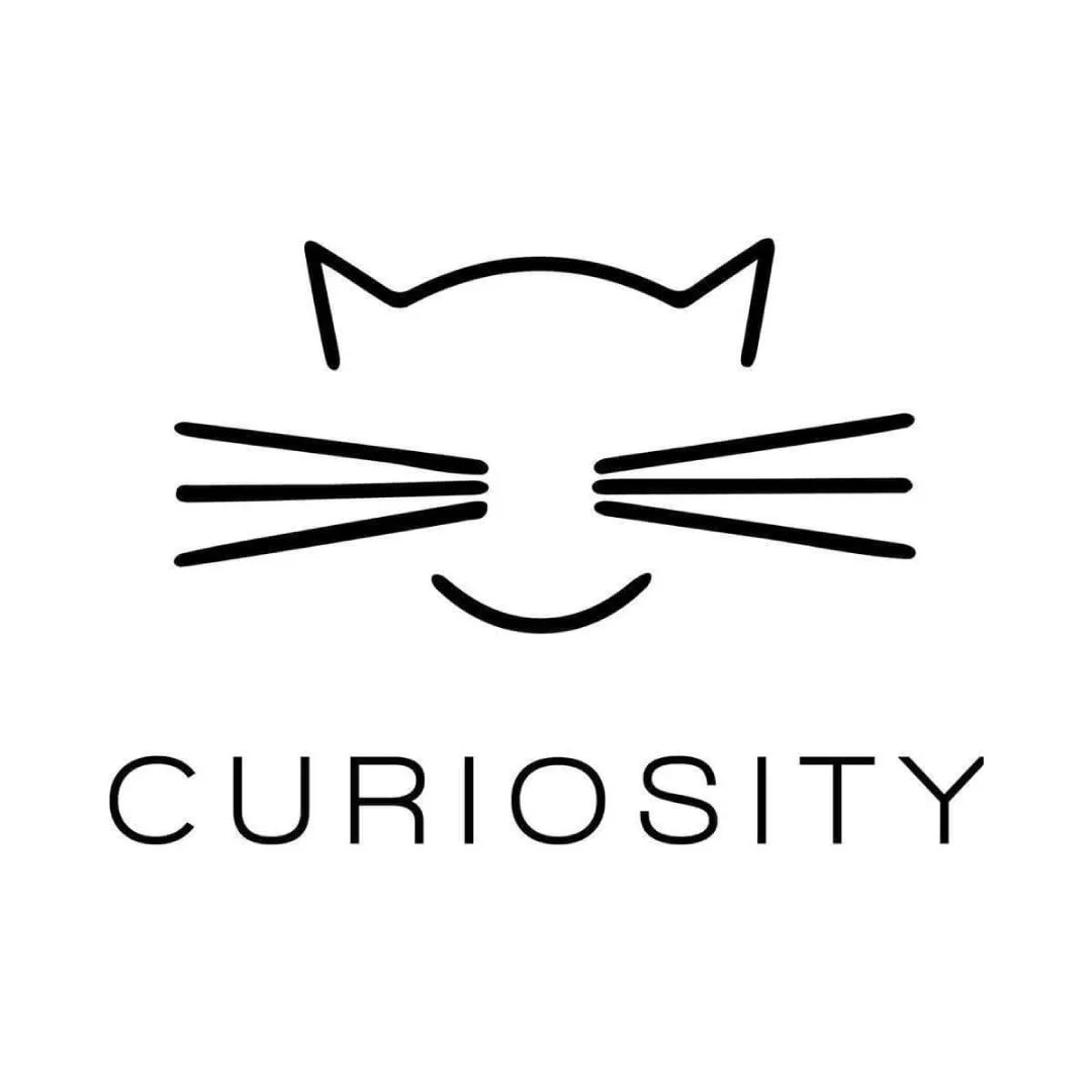 A minimalist black and white line drawing of a cat's face with the word 'Curiosity' underneath.