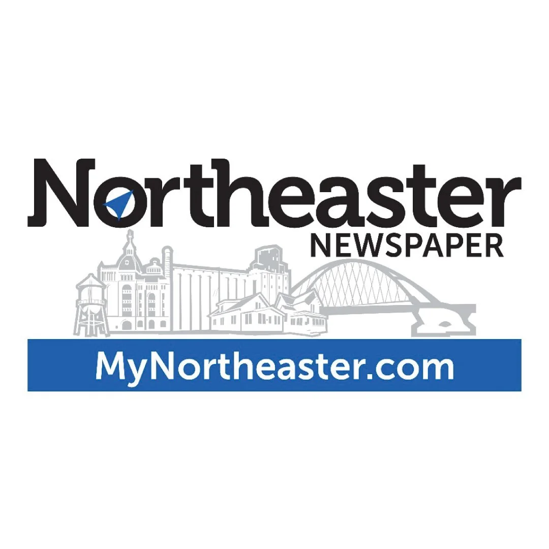 Logo for Northeaster Newspaper featuring a skyline illustration and the website URL MyNortheaster.com.