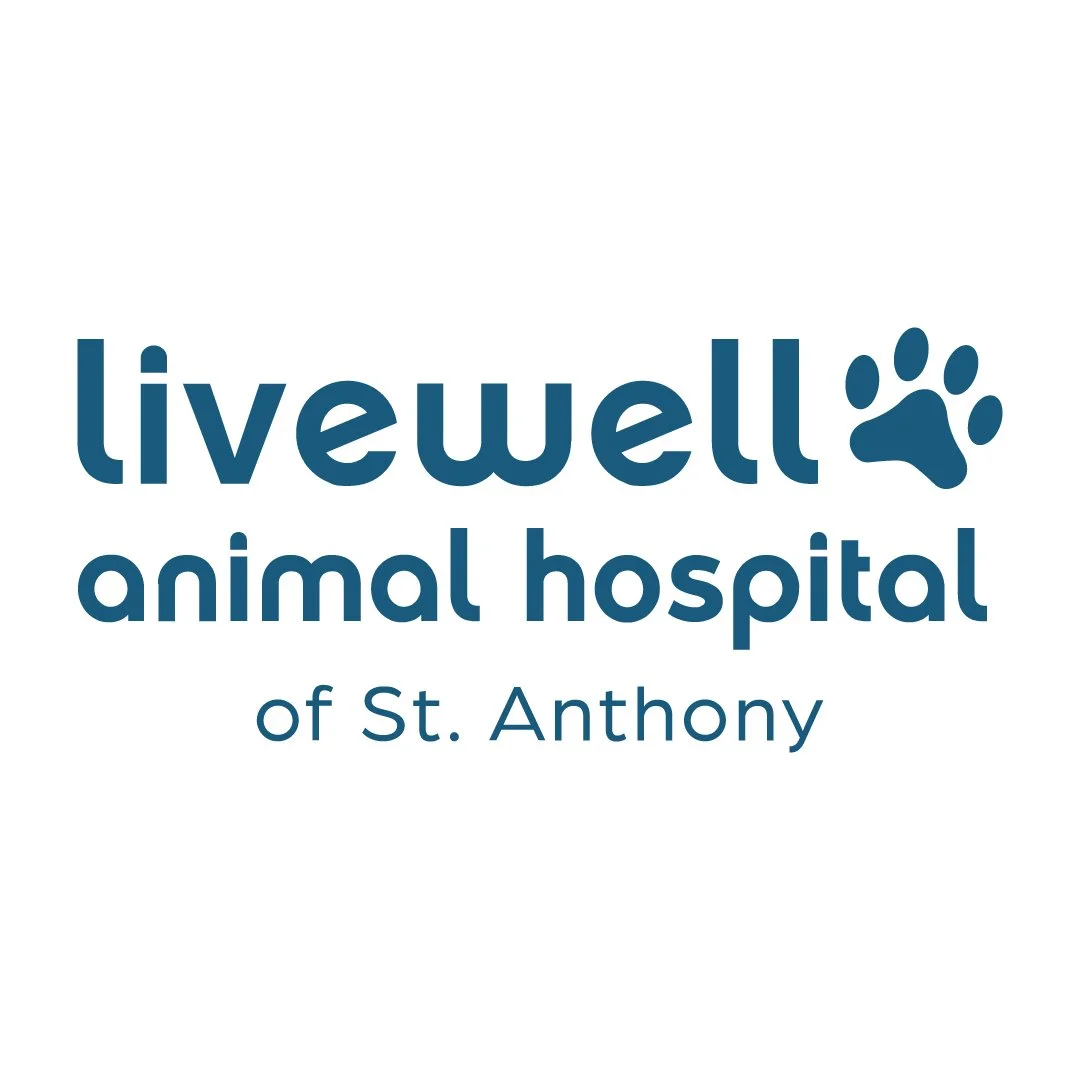 Logo for LiveWell Animal Hospital of St. Anthony with a blue paw print