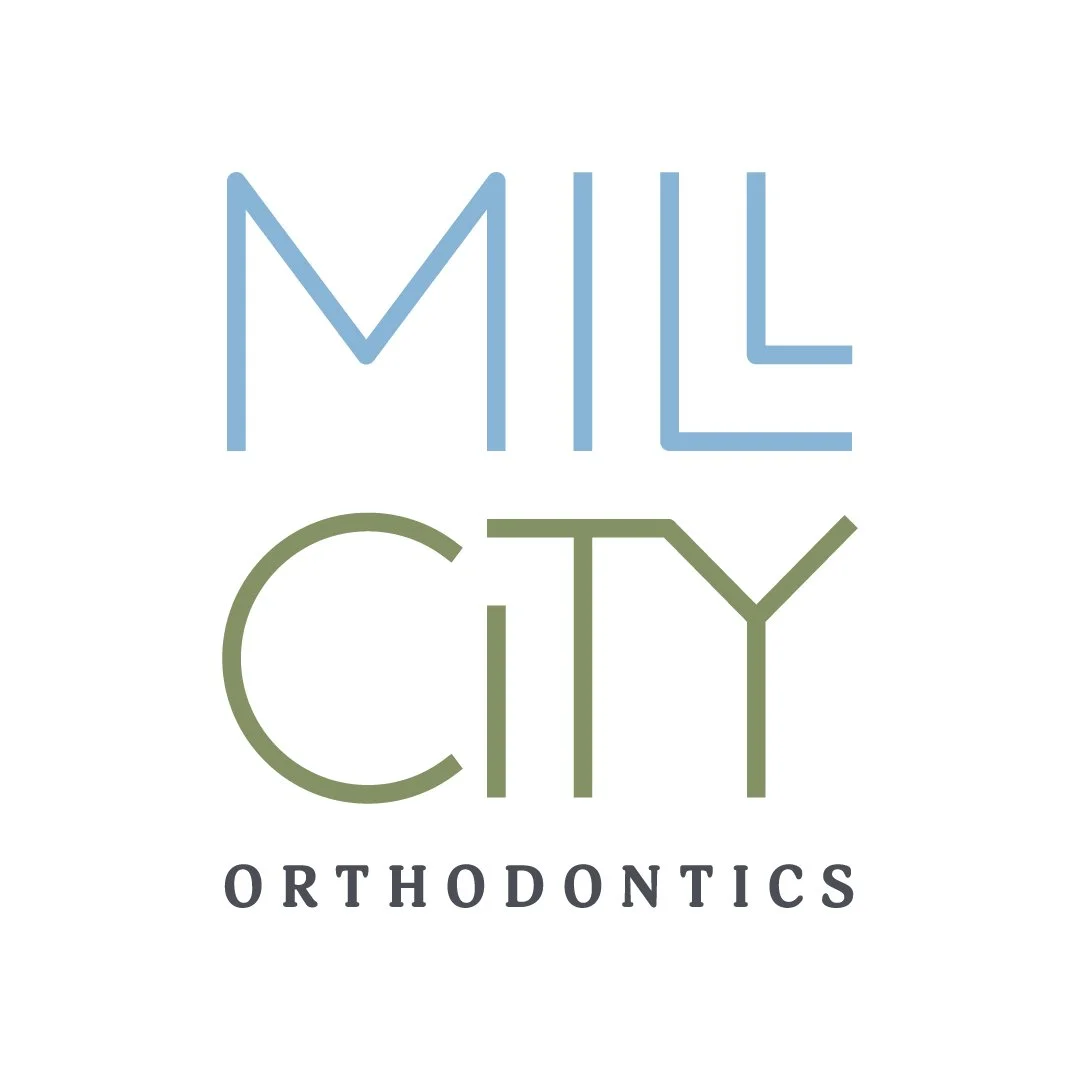 Logo for Mill City Orthodontics with stylized text in blue and green.