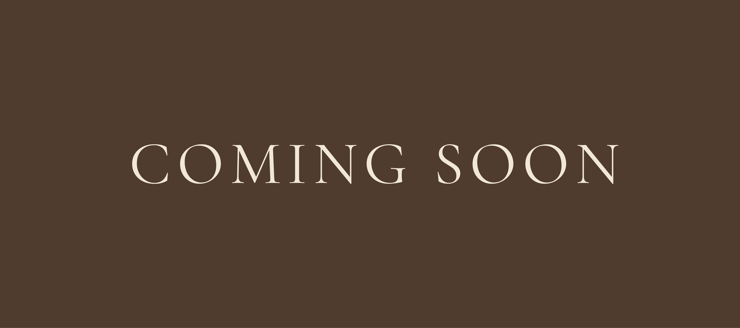 A brown background with the text 'COMING SOON' written in white, indicating an upcoming event or release.