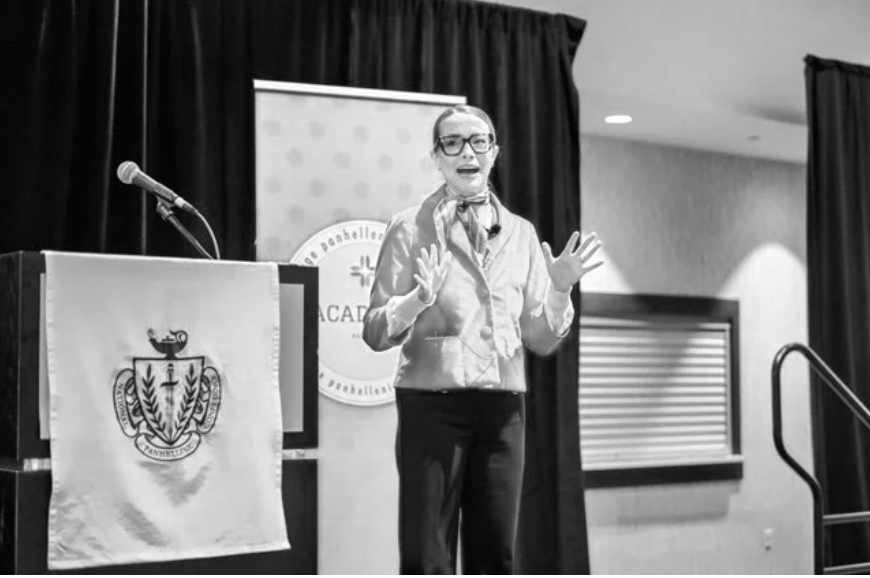 Bright electronic billboards advertising McDonald's, Popeyes, and a book titled 'What Do I Do?' in Times Square. Various pedestrians and cars are visible in the area.