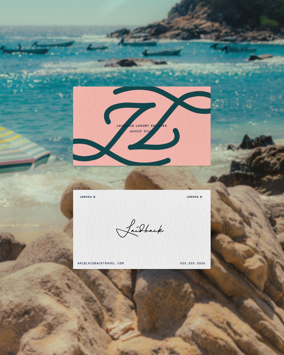 Business cards with 'Laidback' branding placed on rocks at a beach with boats in the water and rocky hills in the background.