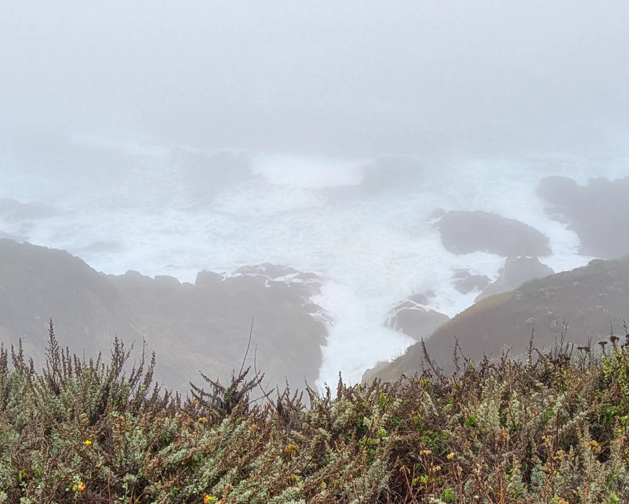 foggy weather coastal cliffs with ocean waves landscape photography