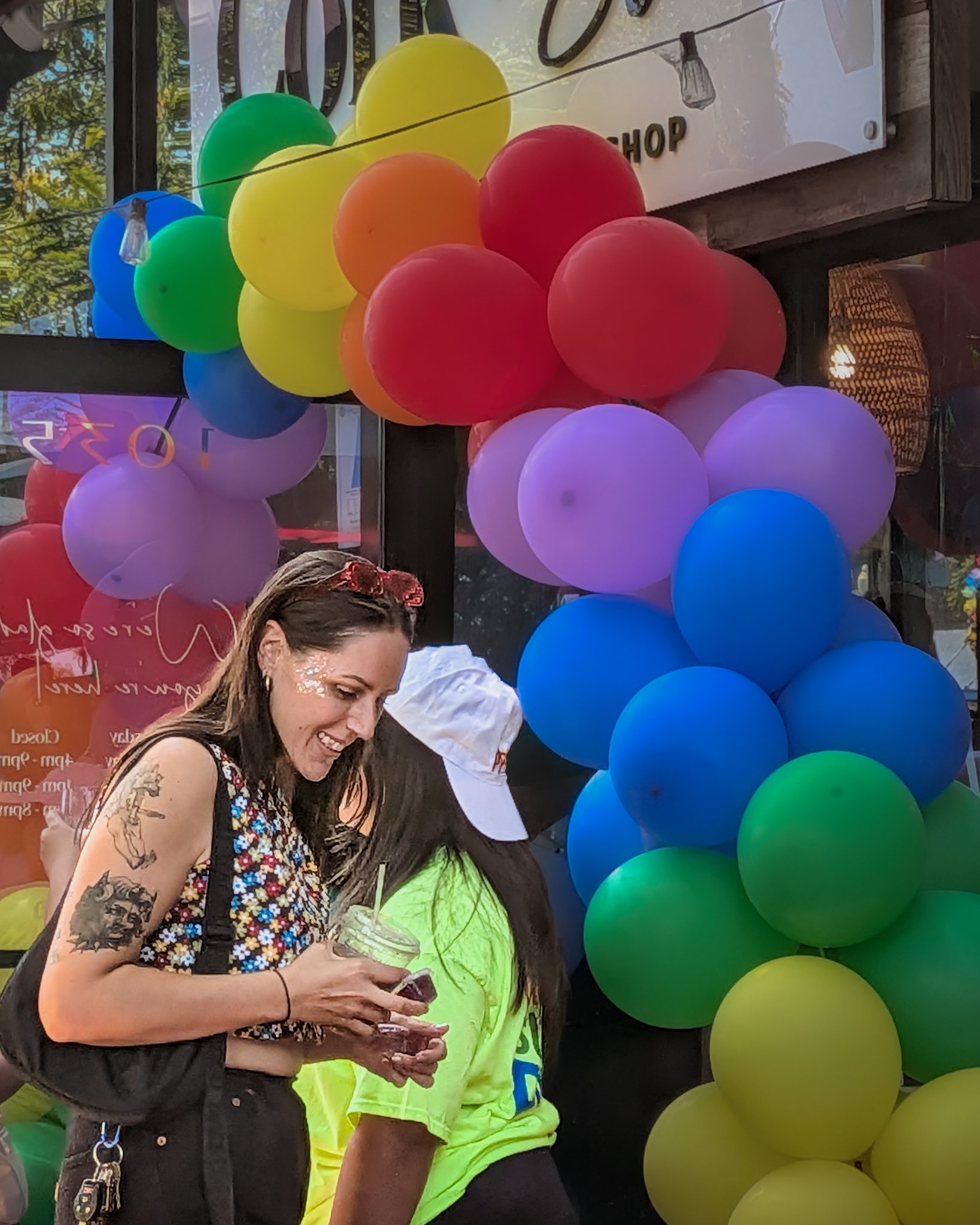 Two parade attendees share a quiet conversation amid the celebration.
San Diego, CA | © Edge of Clarity Photo | Elizabeth Chaney 2026