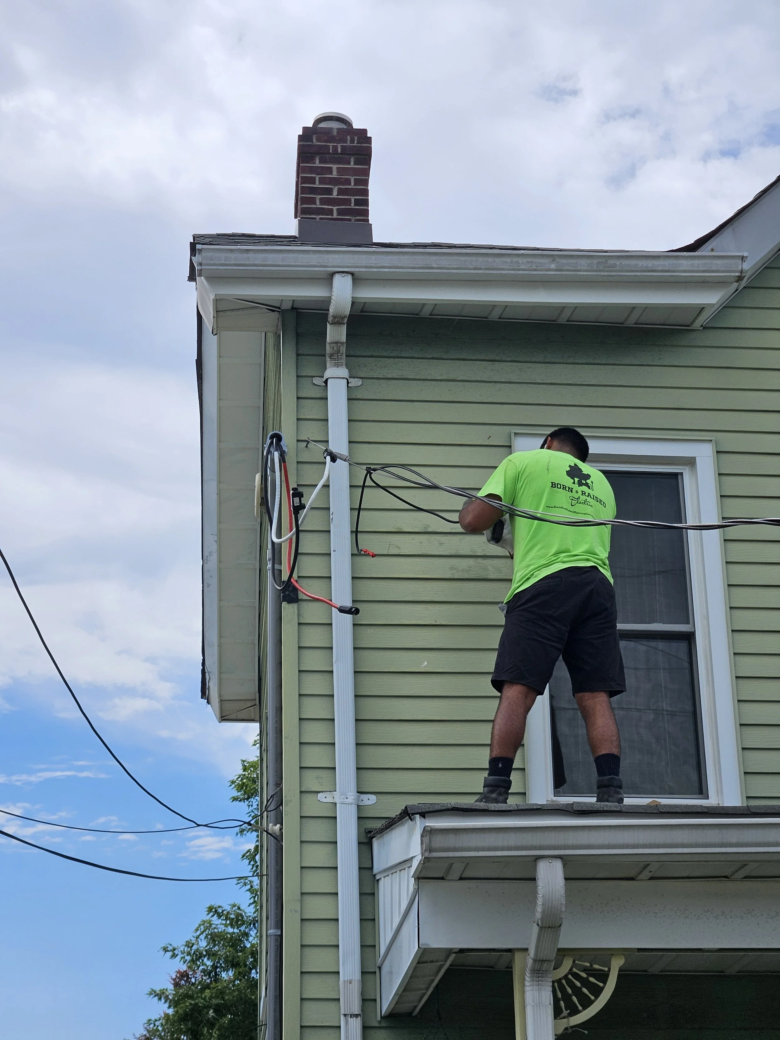 Electrician Installing Backup Battery System for a residential home