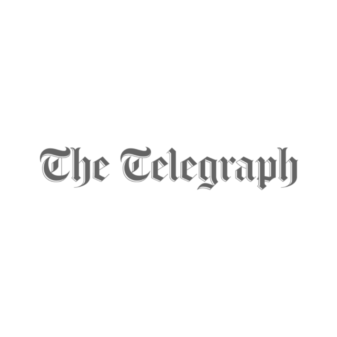 Black background with the logo of The Telegraph in gray Gothic script.