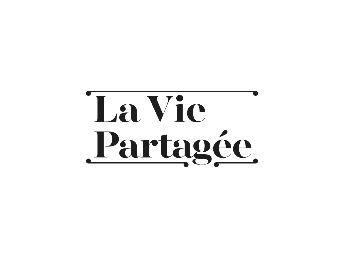 Text reading 'La Vie Partagée' in black font on a white background, with lines above and below the text.