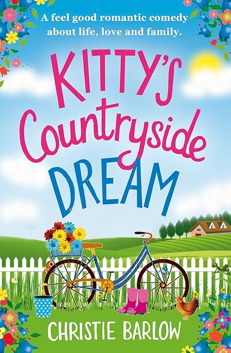 Book cover for "Kitty's Countryside Dream" by Christie Barlow, featuring a bright, colourful illustration of a countryside scene with a bicycle, flowers, a farmhouse in the distance, and a white picket fence.