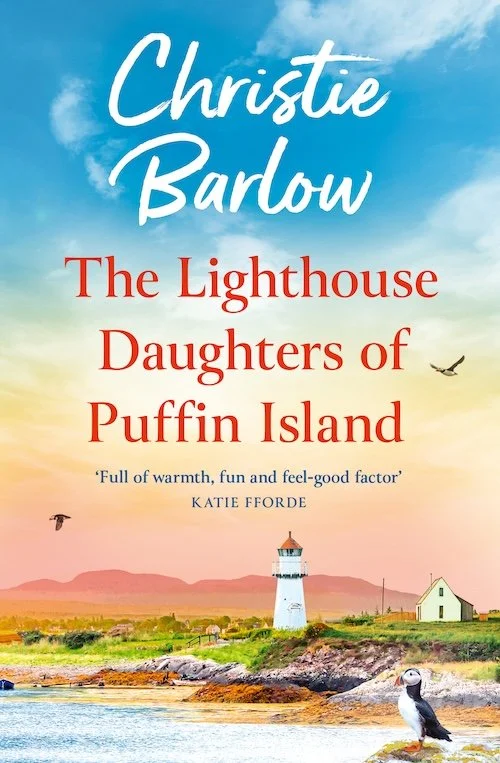 Book cover featuring a lighthouse on Puffin Island with seagulls flying, a puffin bird in the foreground, and a pastel-colored sky.