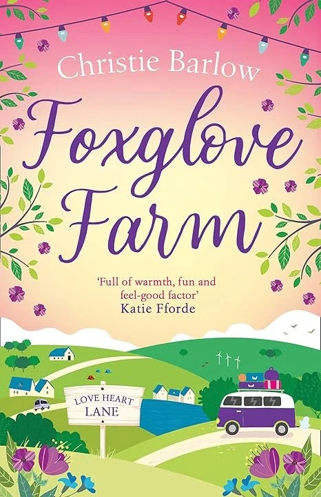 Book cover for "Foxglove Farm" by Christie Barlow, featuring a colorful illustration of a countryside scene with houses, a newsletter sign, a van, and vibrant flowers and leaves, set against a pastel pink and yellow sky with string lights and butterflies.