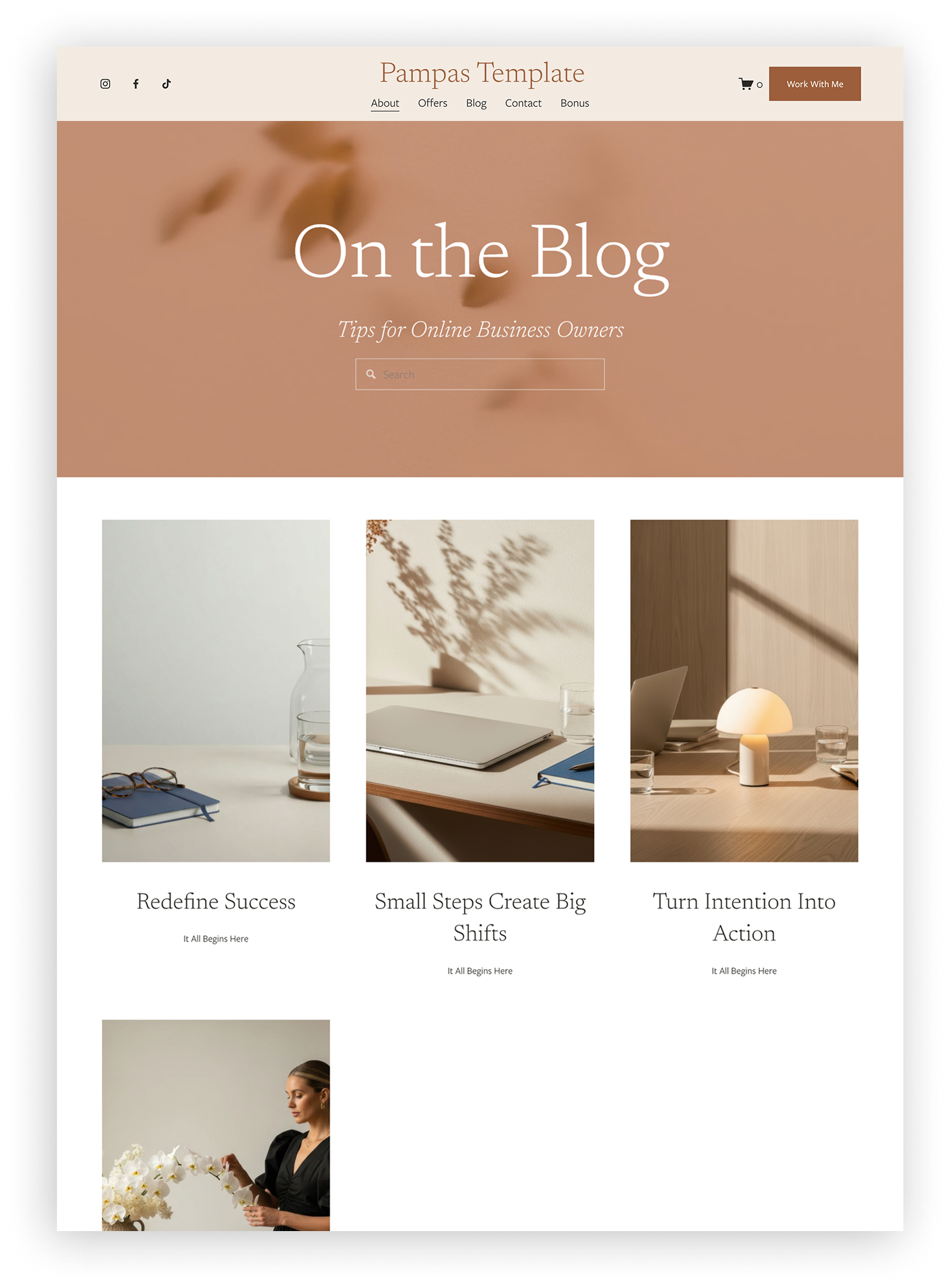 Screenshot of a website homepage titled 'Pampas Template' with navigation links, a blog title 'On the Blog,' and three featured article previews about success, small steps, and turning intentions into action, with various images of minimalist desktop scenes and a woman with flowers.