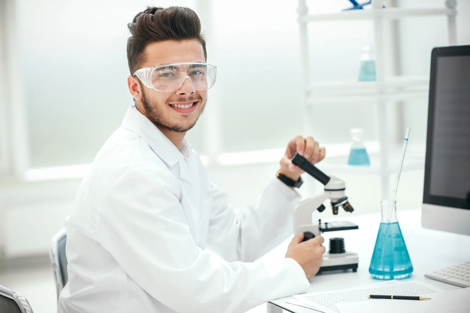 Young scientist while working in a lab.