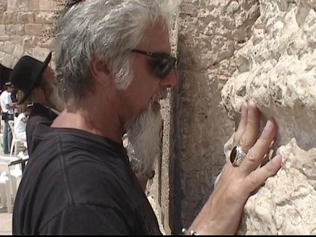 Putting the lyrics to two visons I wrote songs about. The Jews accepting Jesus as the Messiah.  I stuck the lyrics inside the Wailing Wall. When the wall cracks, it will be too late for the Jews to gain salvation; the ones who have not already accept