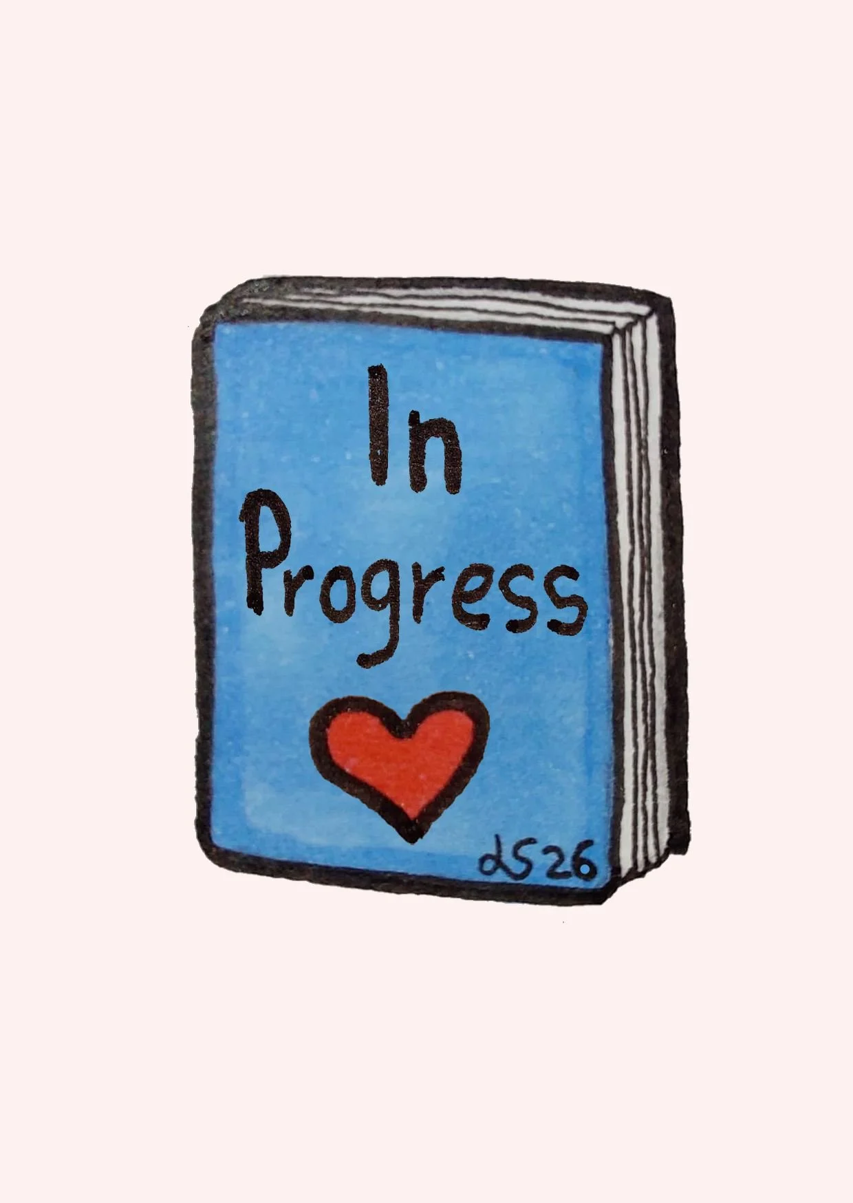 A drawing of a book with a blue cover that says 'In Progress' and a red heart underneath, signed with 'LS26'.