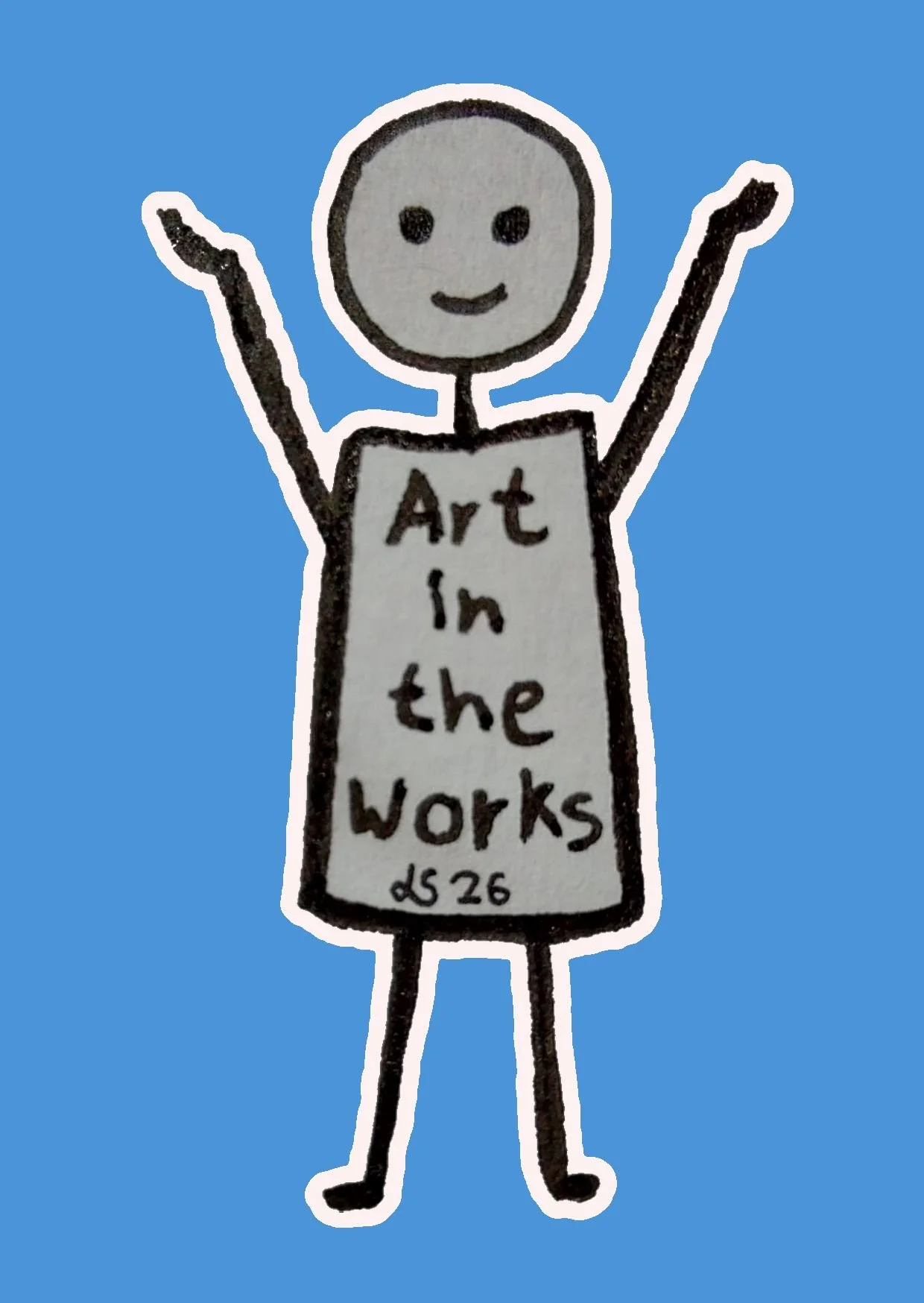 A simple drawing of a stick figure with a smiling face, raising both arms, wearing a rectangular sign with the words "Art in the Works" and the signature "LS26" written on it.