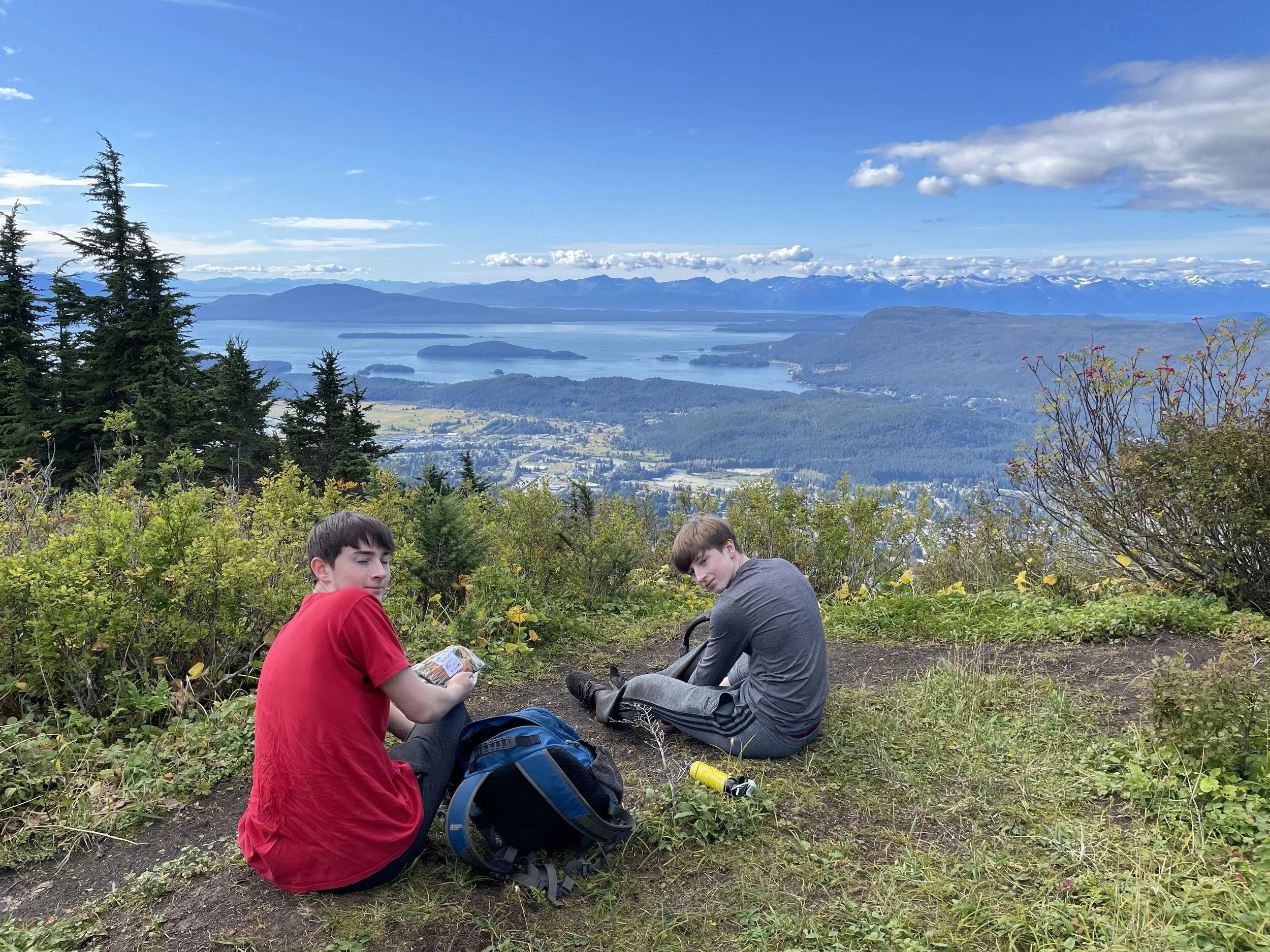 Guest hiking Thunder Mountain Juneau Alaska with Juneau Land and Sea Adventures.