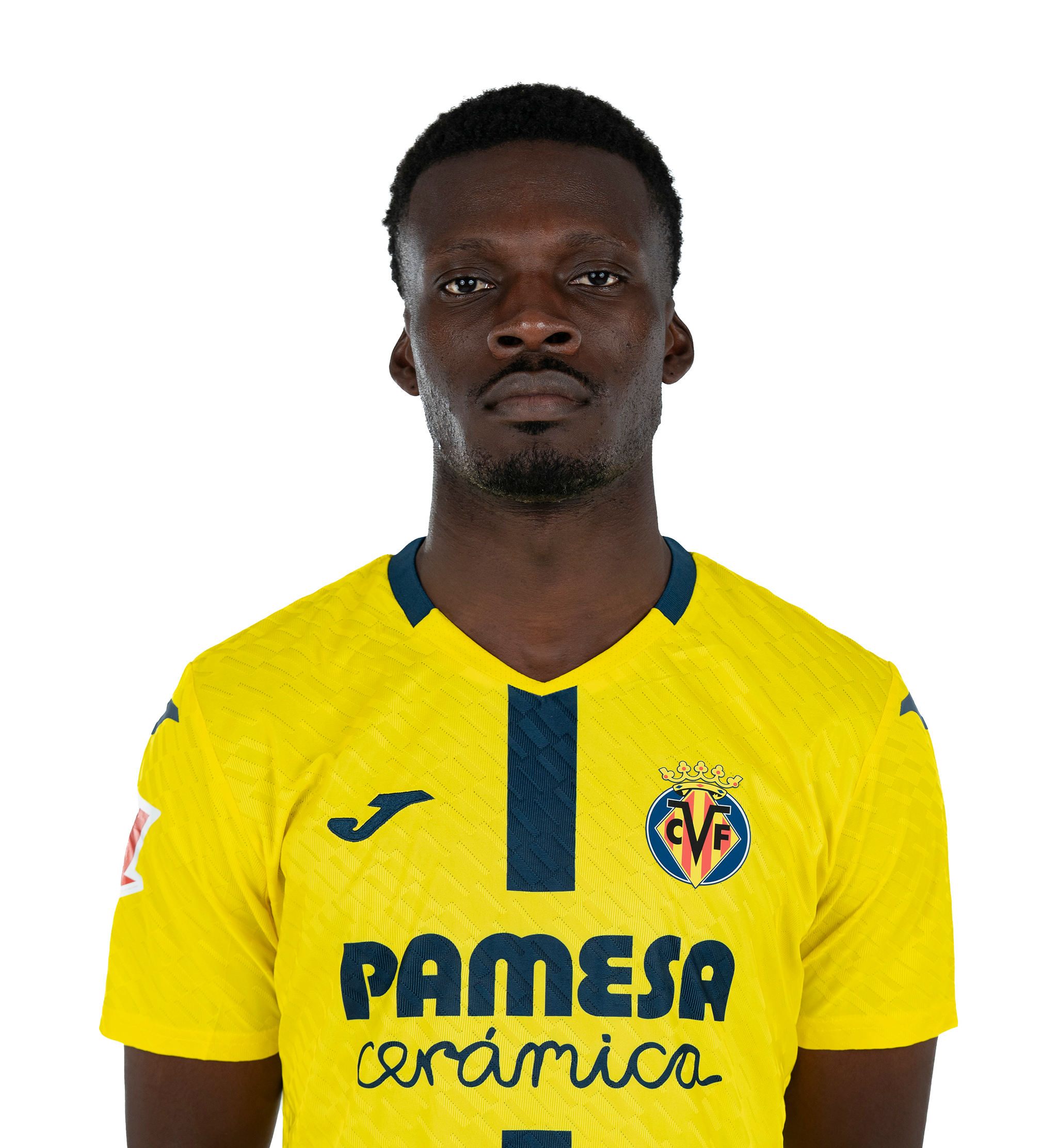 A man wearing a yellow soccer jersey with the VFL emblem, a J logo, and the words PAMESA cerámica.