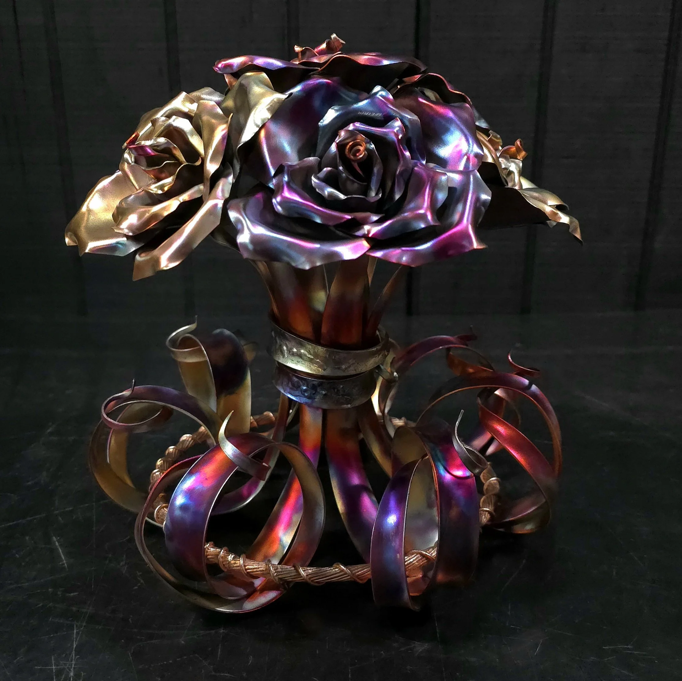 A Custom 7 Blossom Rose Bouquet Centerpiece with Multiple Color Finishes Created as a Retirement Gift
