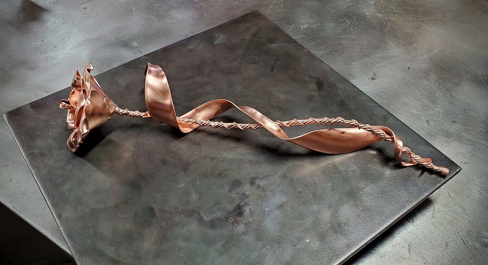 memorial-copper-rose-sculpture-bright-side