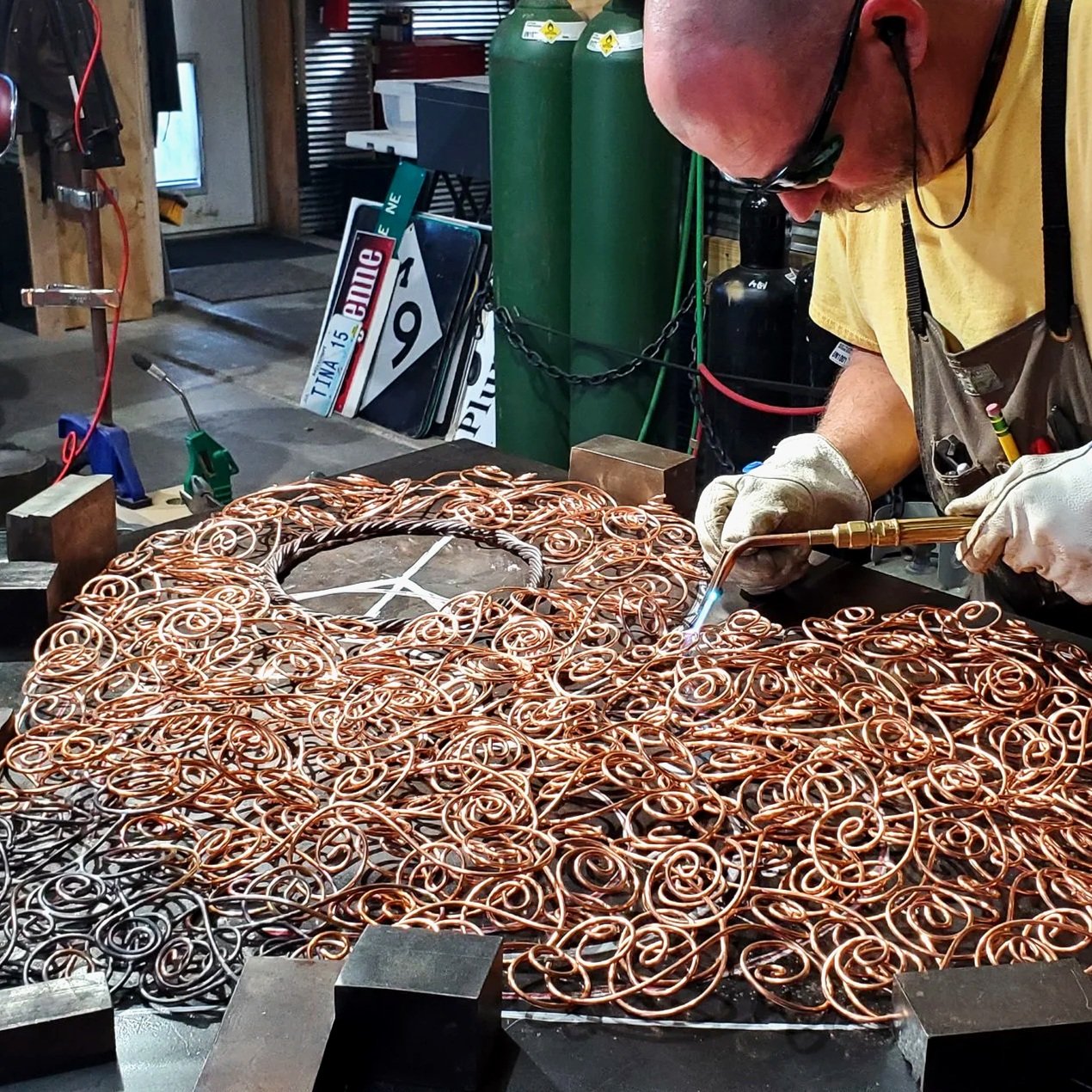 copper-coil-peace-sign-heart-work-in-progress-mark