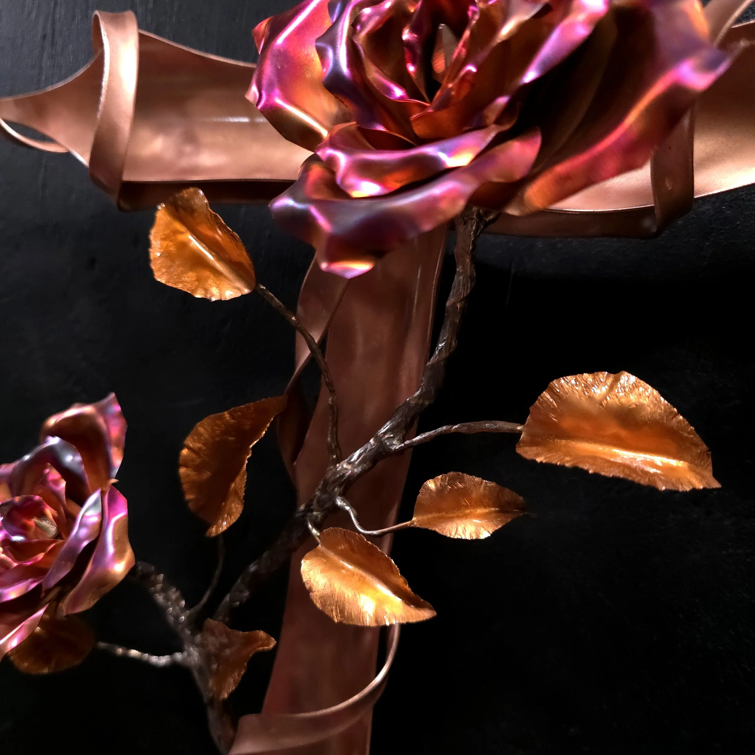 polished-copper-cross-with-vining-roses-center-close