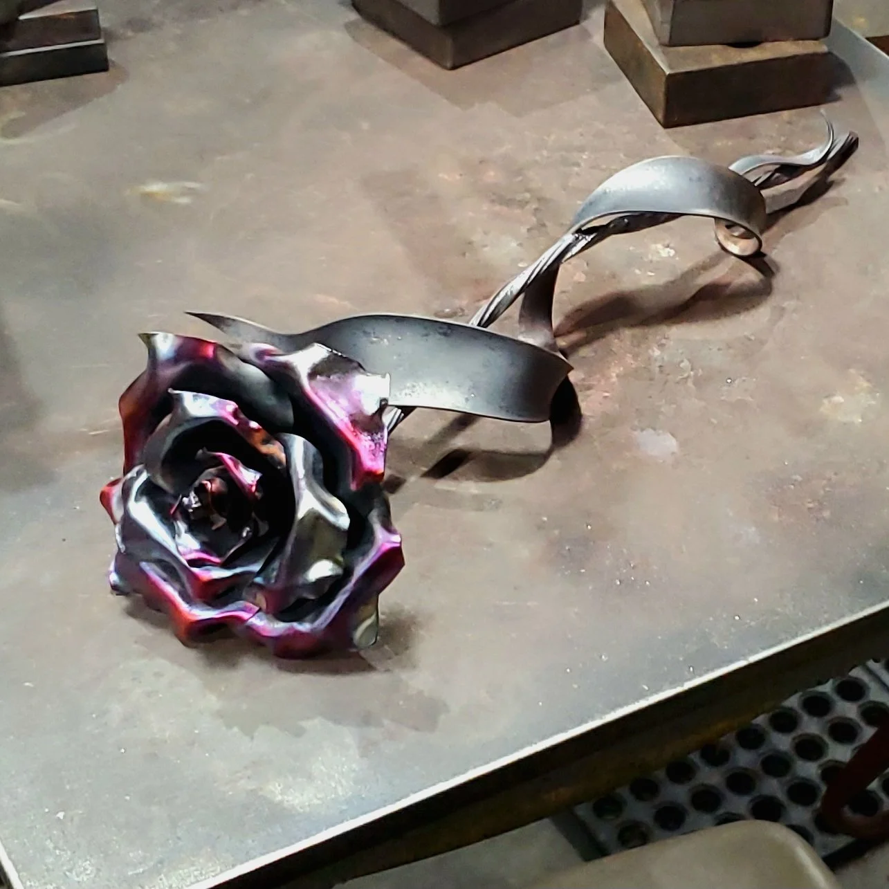 memorial-copper-rose-sculpture-blue-flame