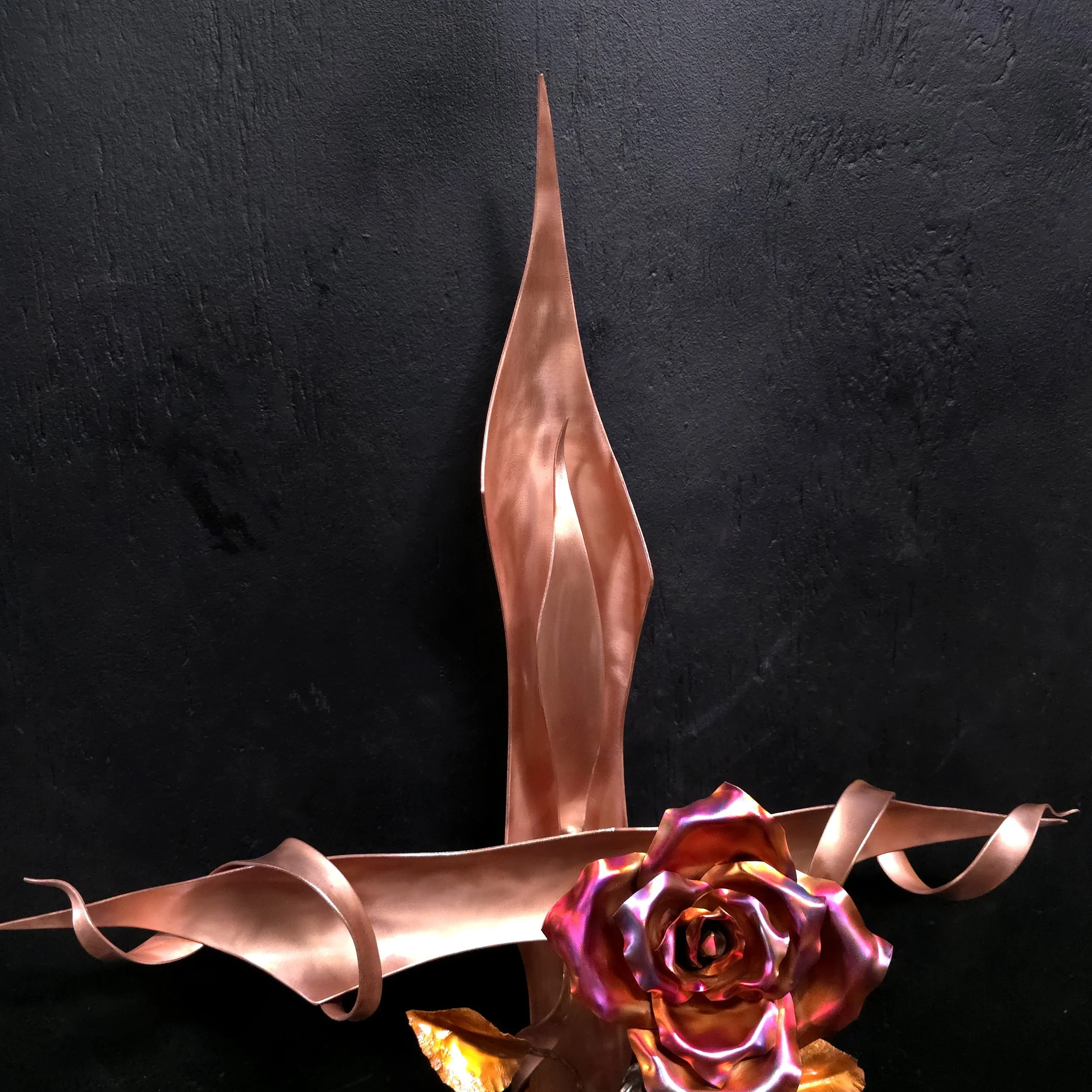 polished-copper-cross-with-vining-roses-top-tip