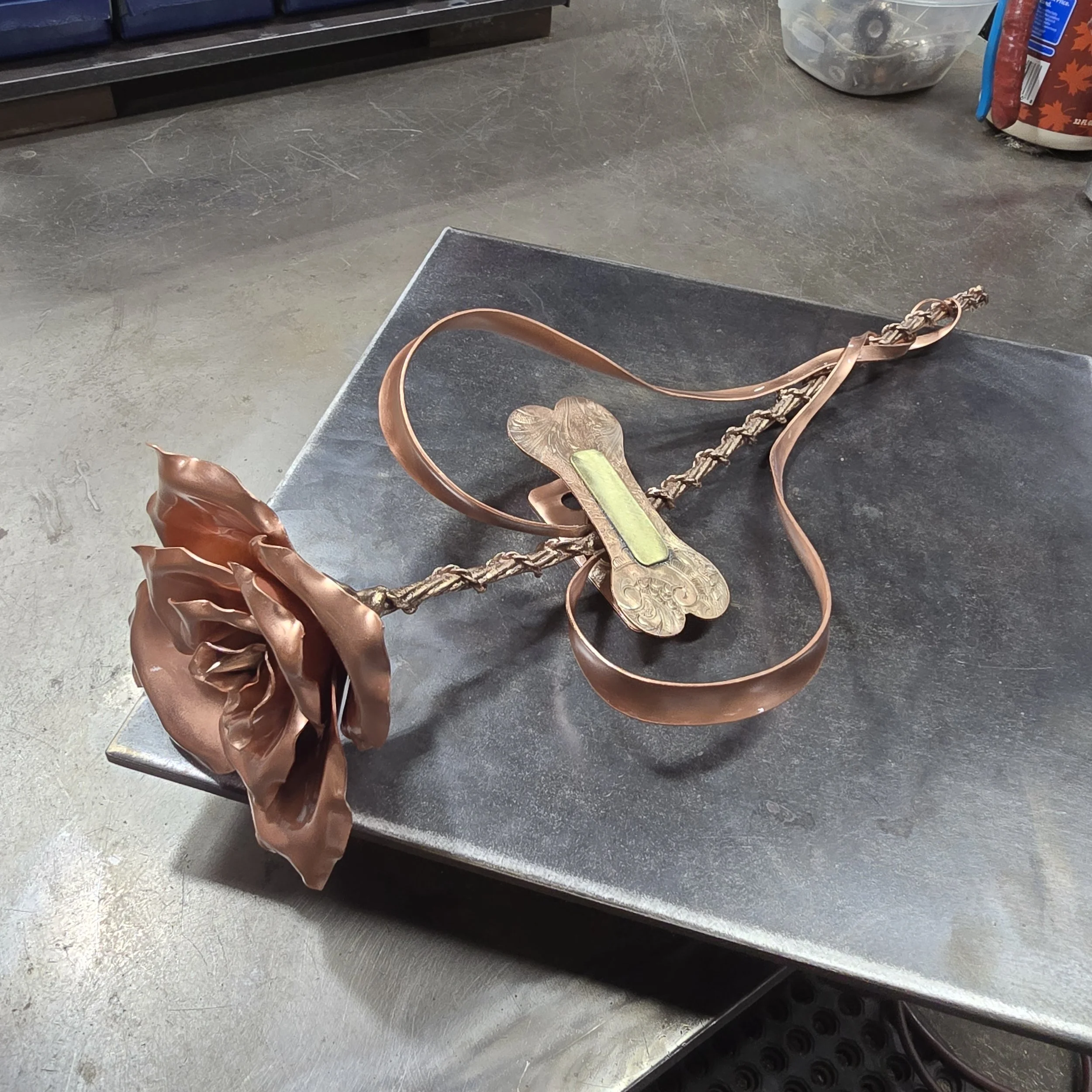 Custom Commissioned Police K9 Dog Memorial Plaque Sculpture for Outdoor Monument Display. Copper Single Stem Rose in Bright Copper Finish with a Dog Bone Name Plate.