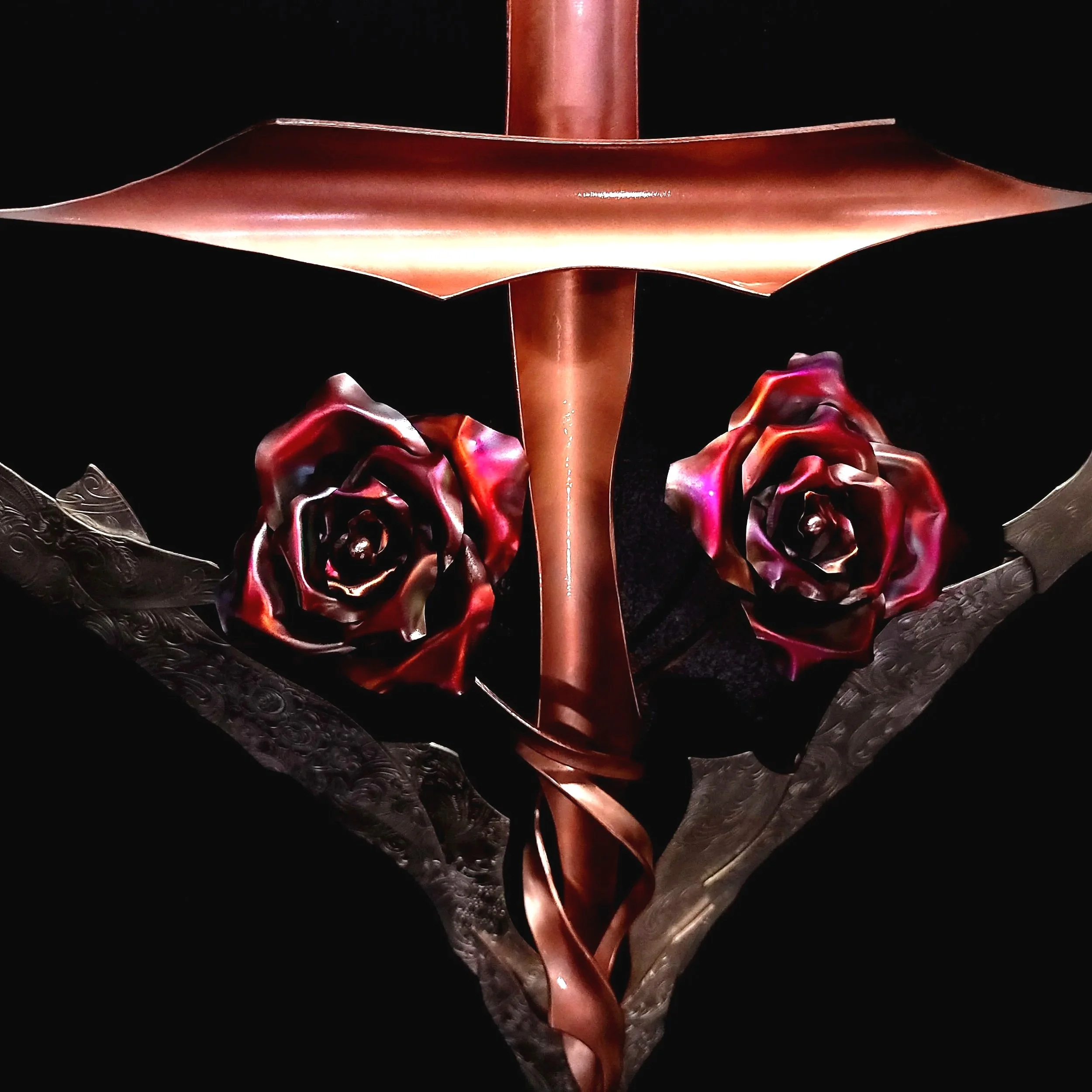 sacred-bond-silver-copper-heart-cross-roses-close-up