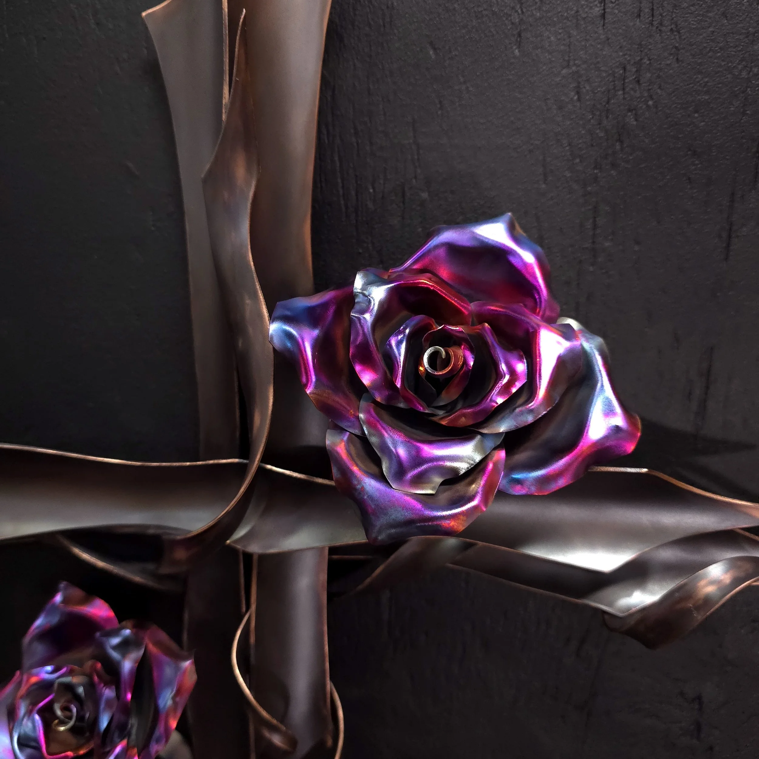 copper-serenity-cross-with-roses-blue-flame-center-close