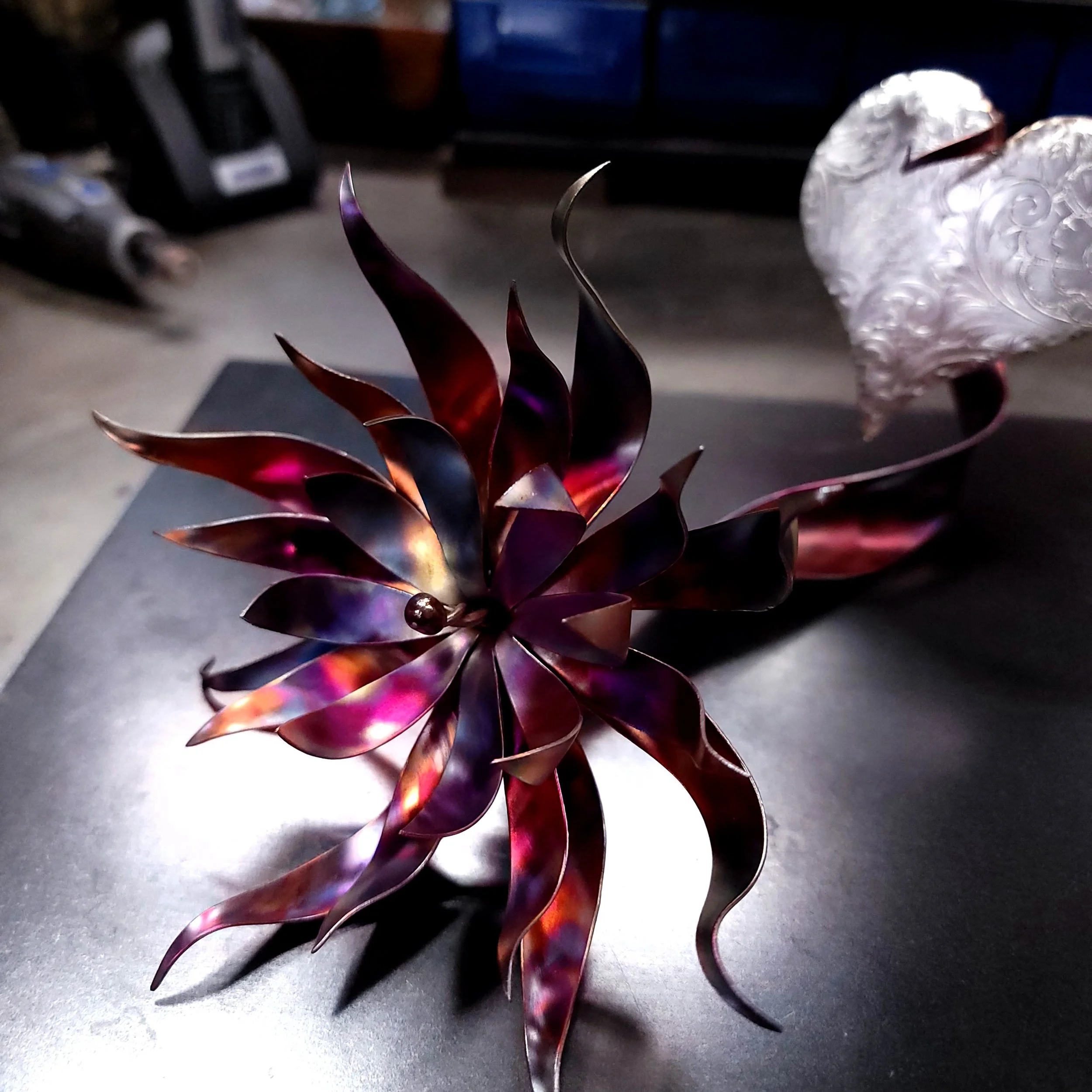 desire-copper-flower-with-heart-dark-close