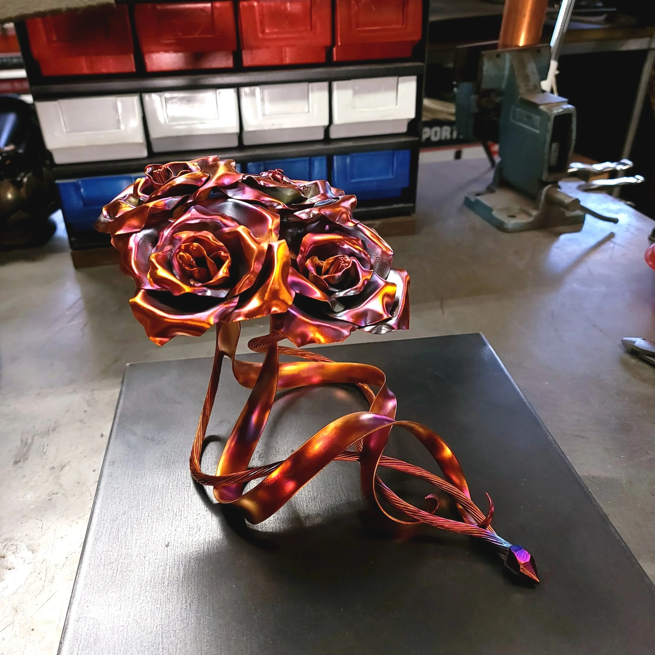 family-copper-rose-bouquet-sculpture-side