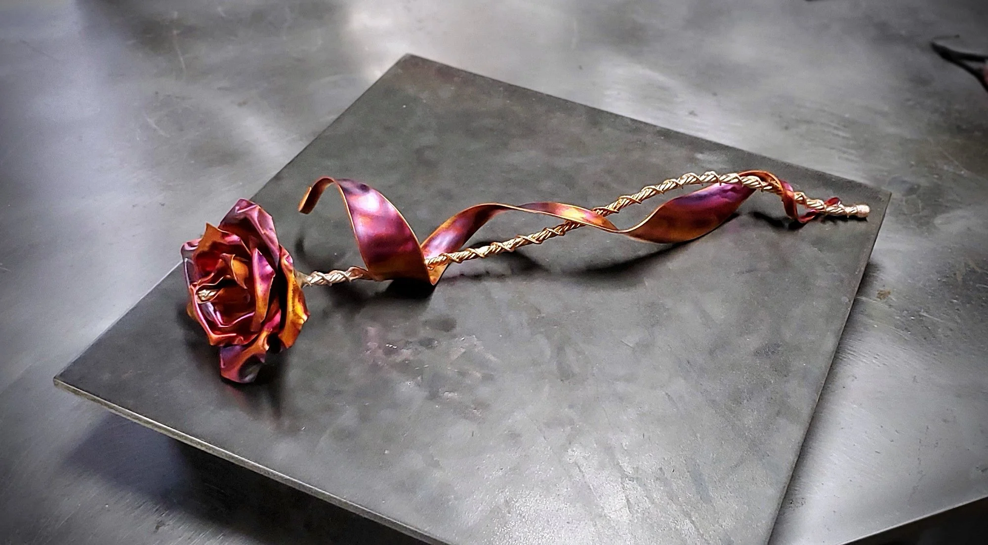 memorial-copper-rose-sculpture-flame-side