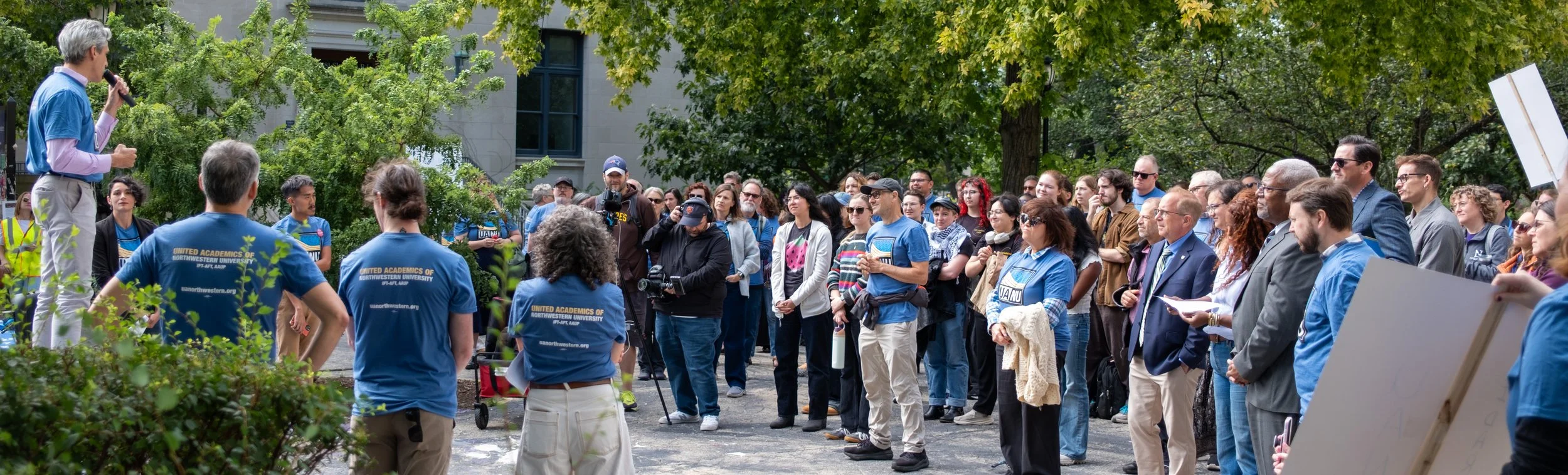 UANU members and supporters rallying at the Rock, being addressed by Daniel Biss