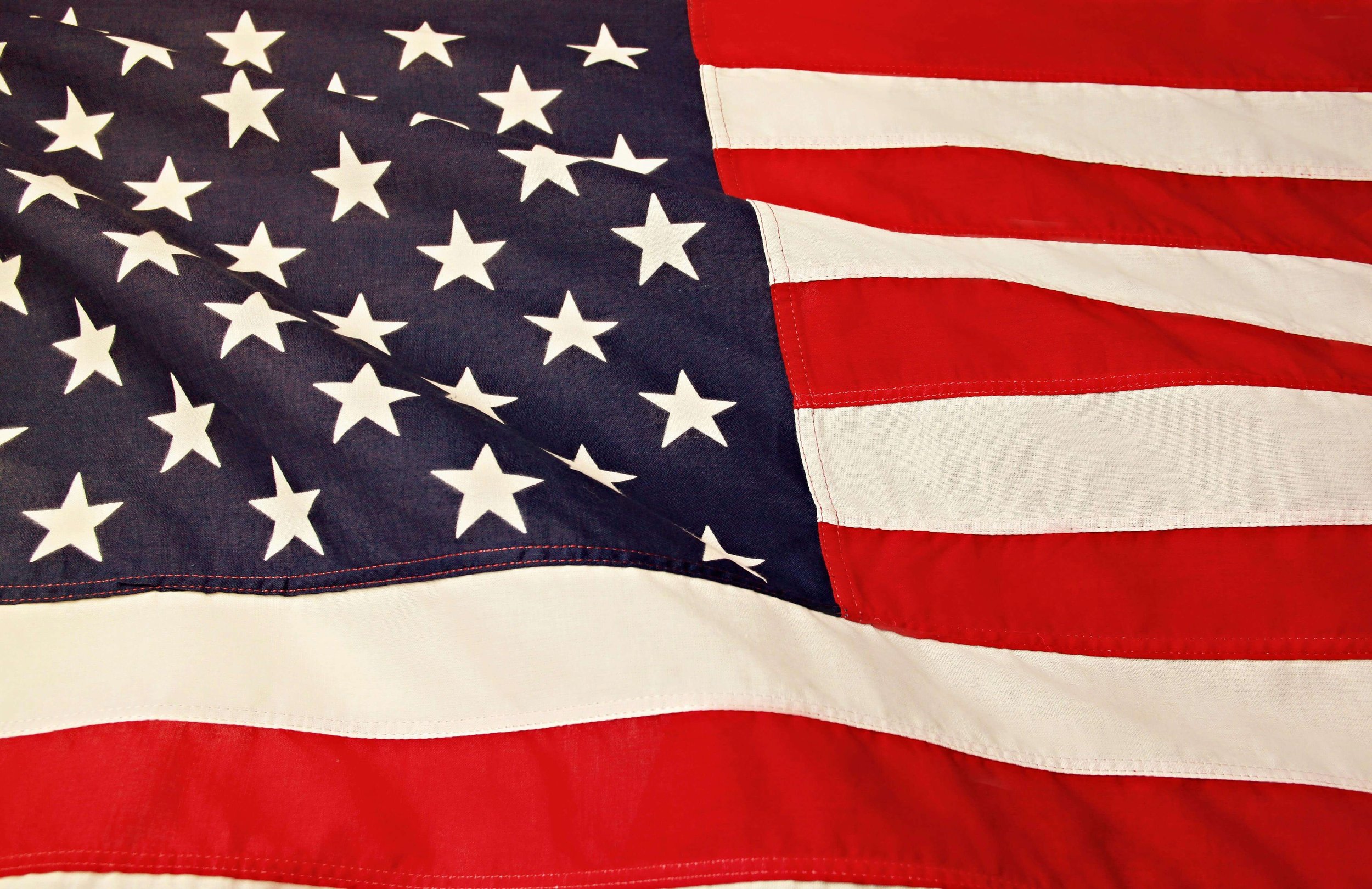 Close-up of the American flag with stars and stripes