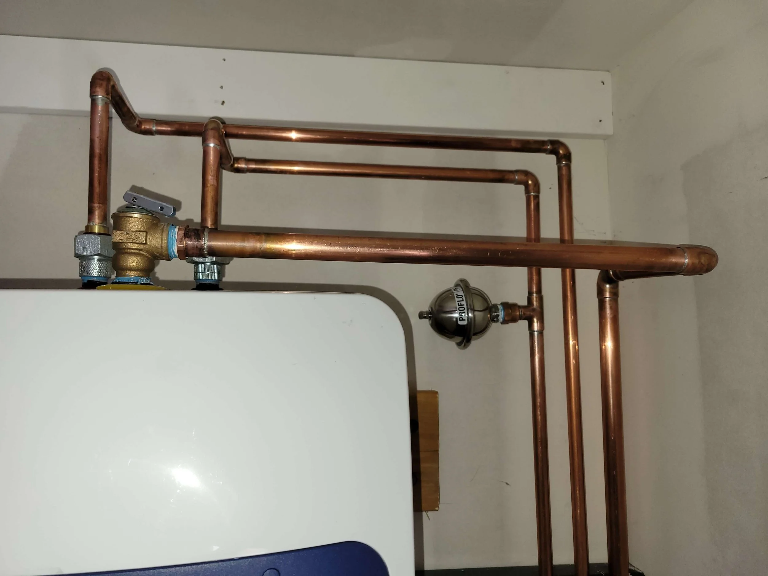 Copper pipes and fittings connected to a boiler or heating system