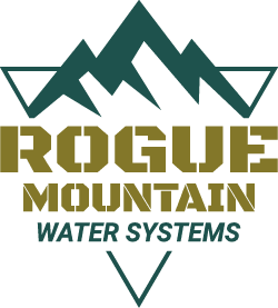 Logo of Rogue Mountain Water Systems featuring stylized mountain peaks and bold text