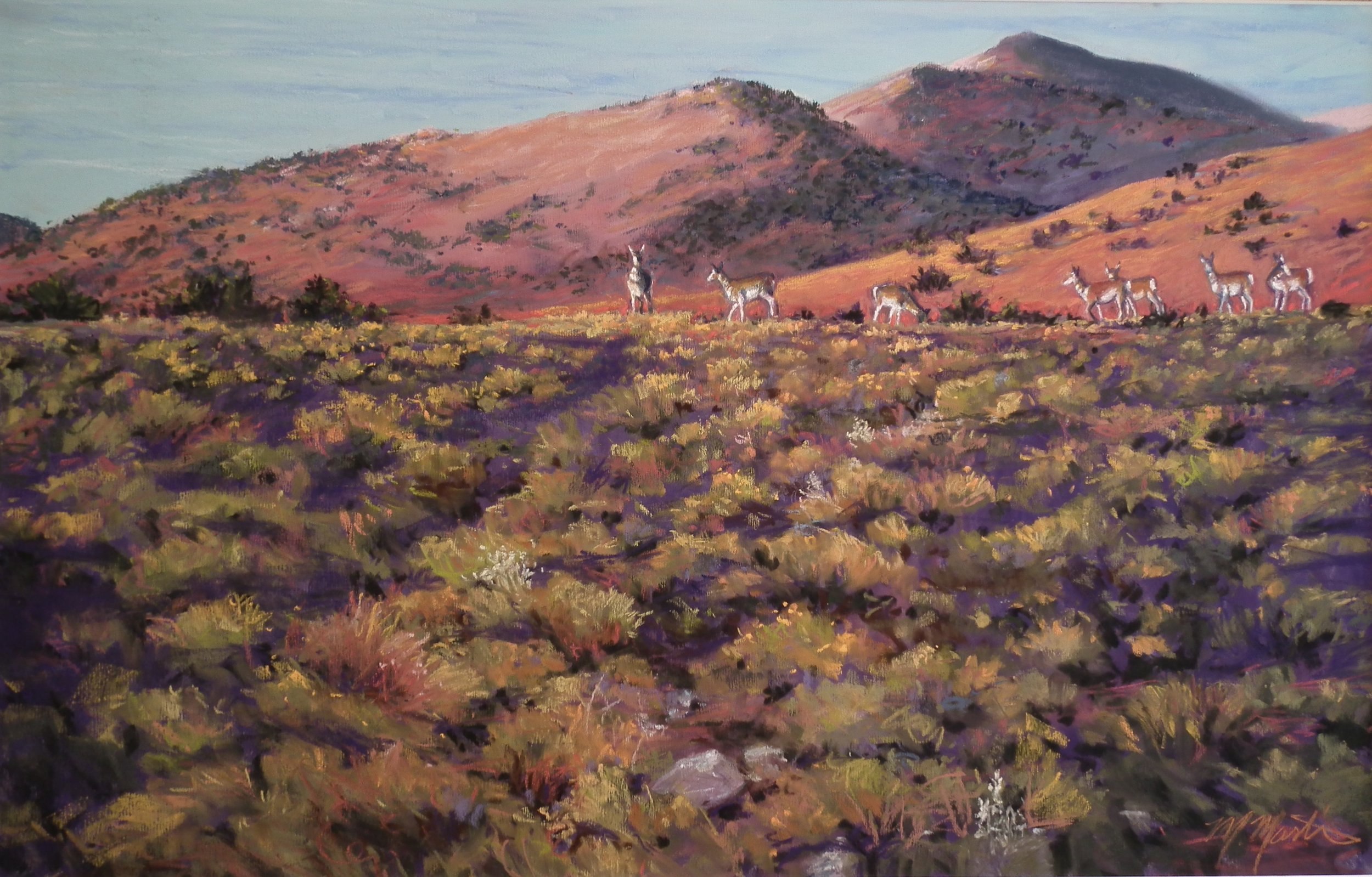 Painting of a desert landscape with mountains in the background, dotted with sparse vegetation, and a group of six white donkeys walking across the terrain.