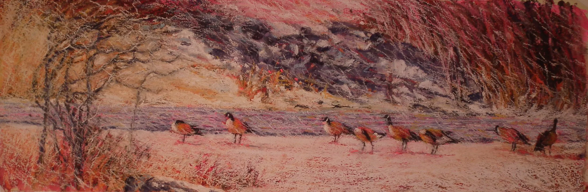 A painting of a winter landscape with a group of small birds on snow-covered ground, leafless trees, and snow-covered hills in the background with colorful sky.