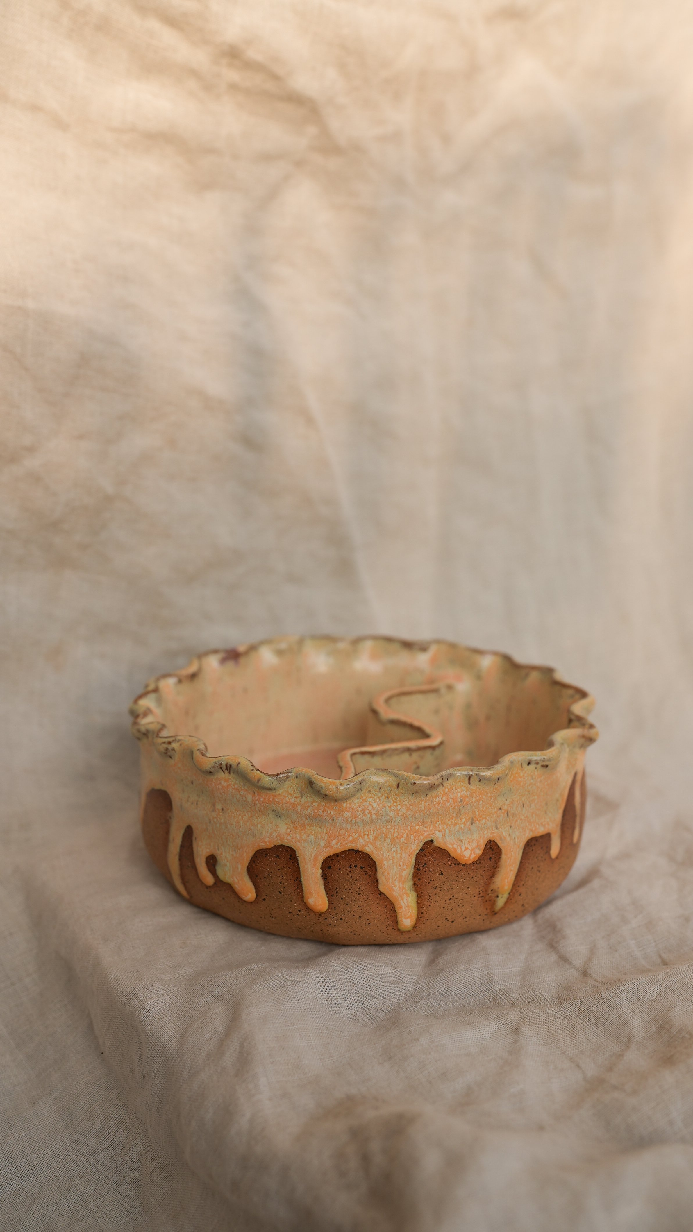 Drippy yellow soup & bread bowl