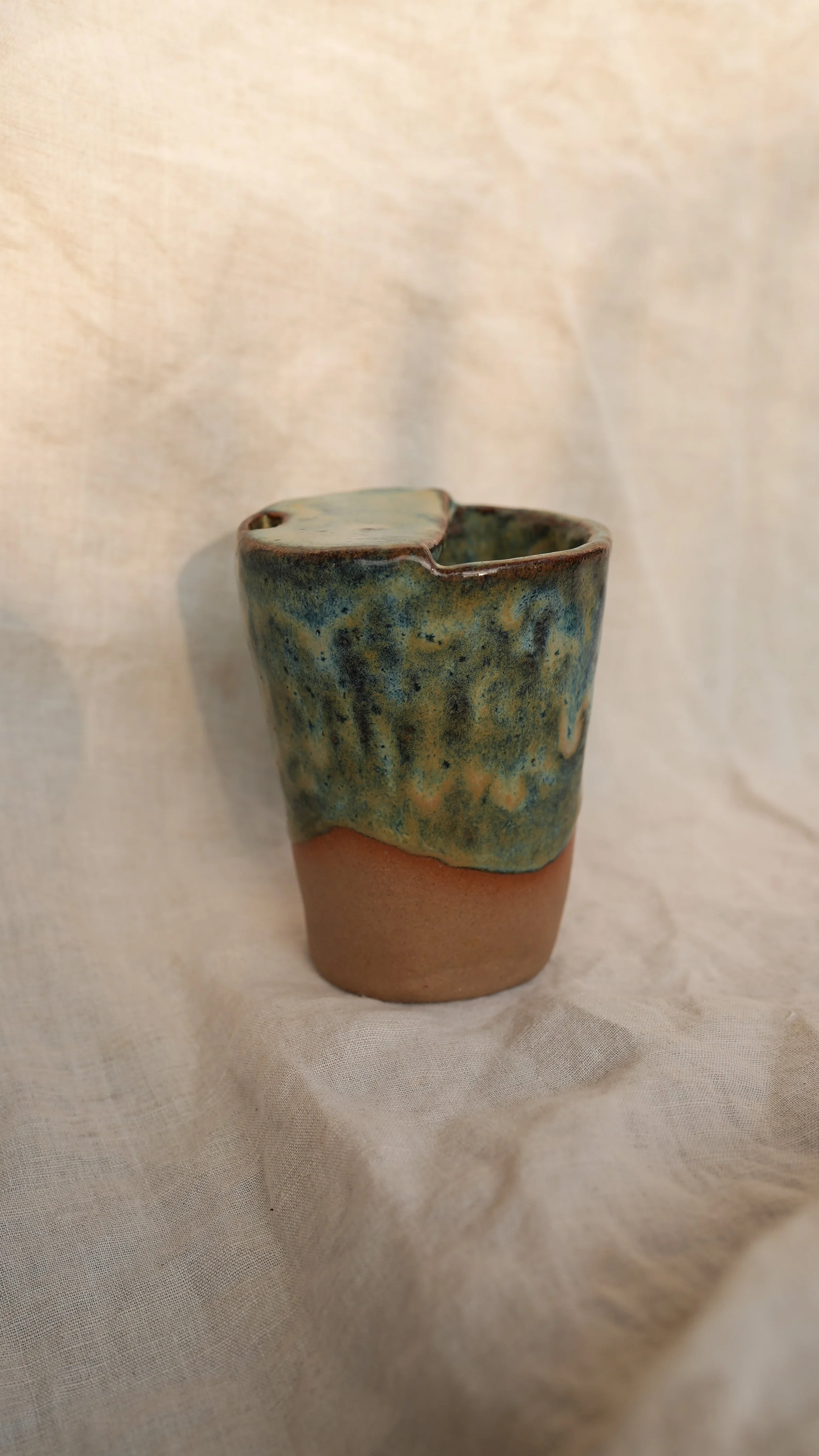 Green drippy travel mug