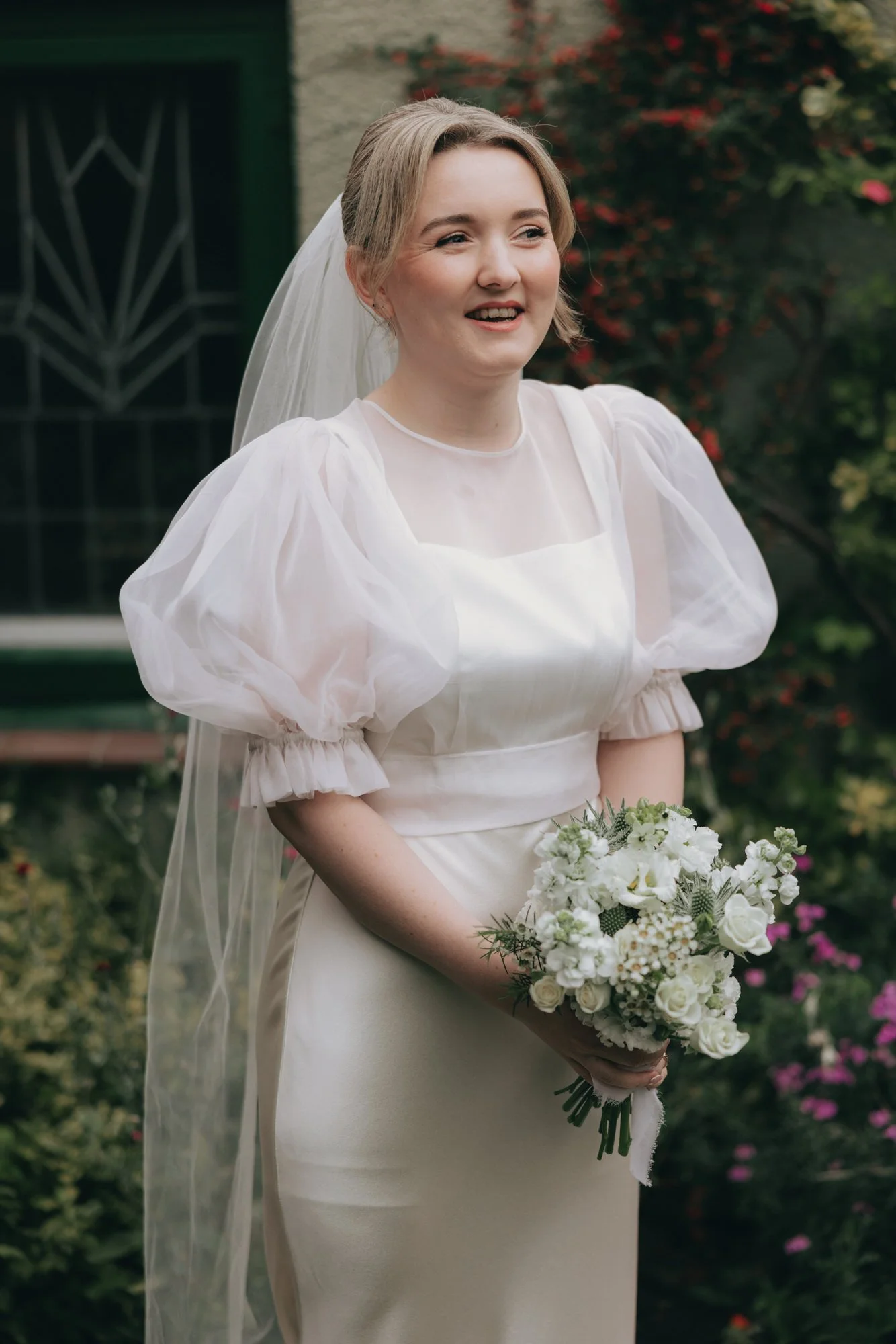 Erin getting ready at home for her intimate Glasgow city wedding