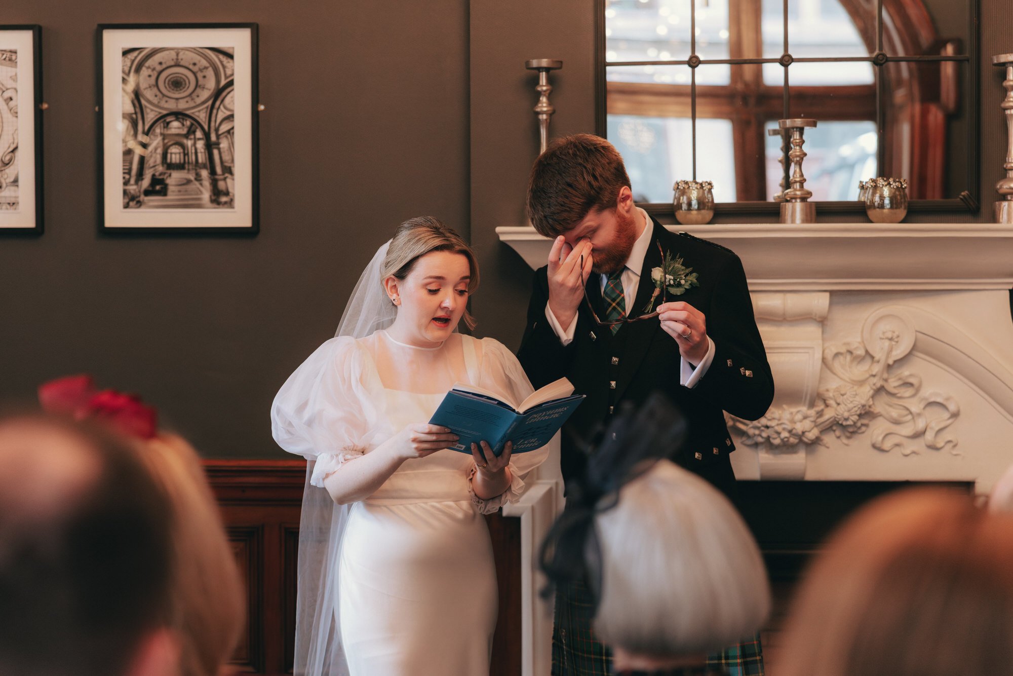 A candid moment from Erin and Matthew’s Glasgow City Chambers ceremony