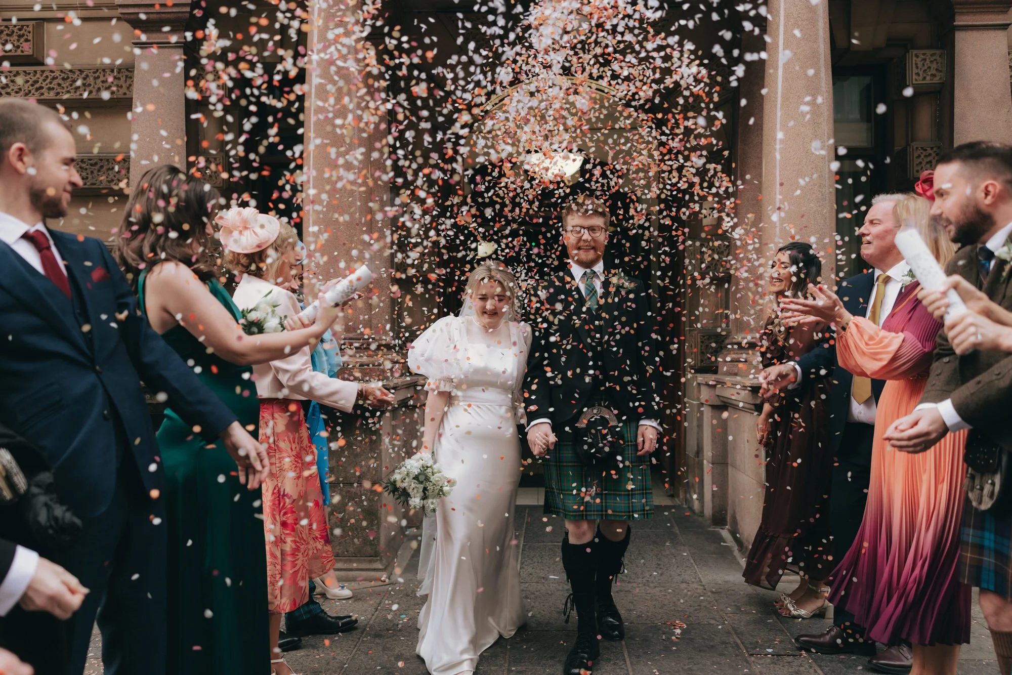 A candid moment from Erin and Matthew’s Glasgow City Chambers ceremony